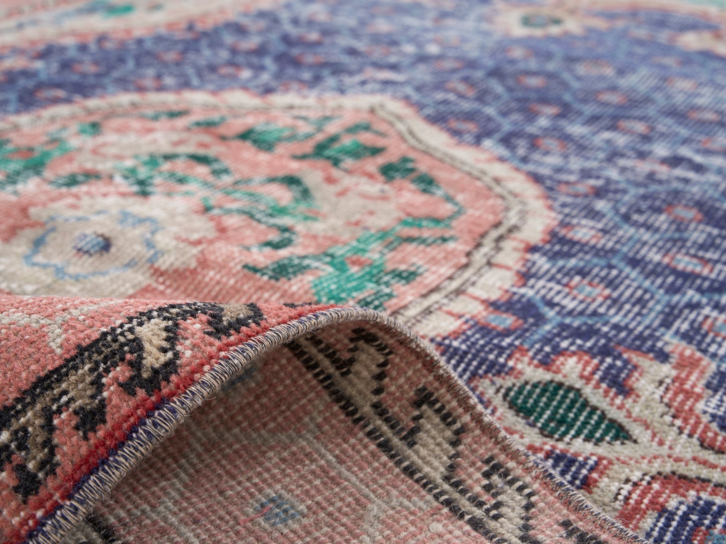Turkish Isparta area rug in deep indigo and rose, view 9 of 10