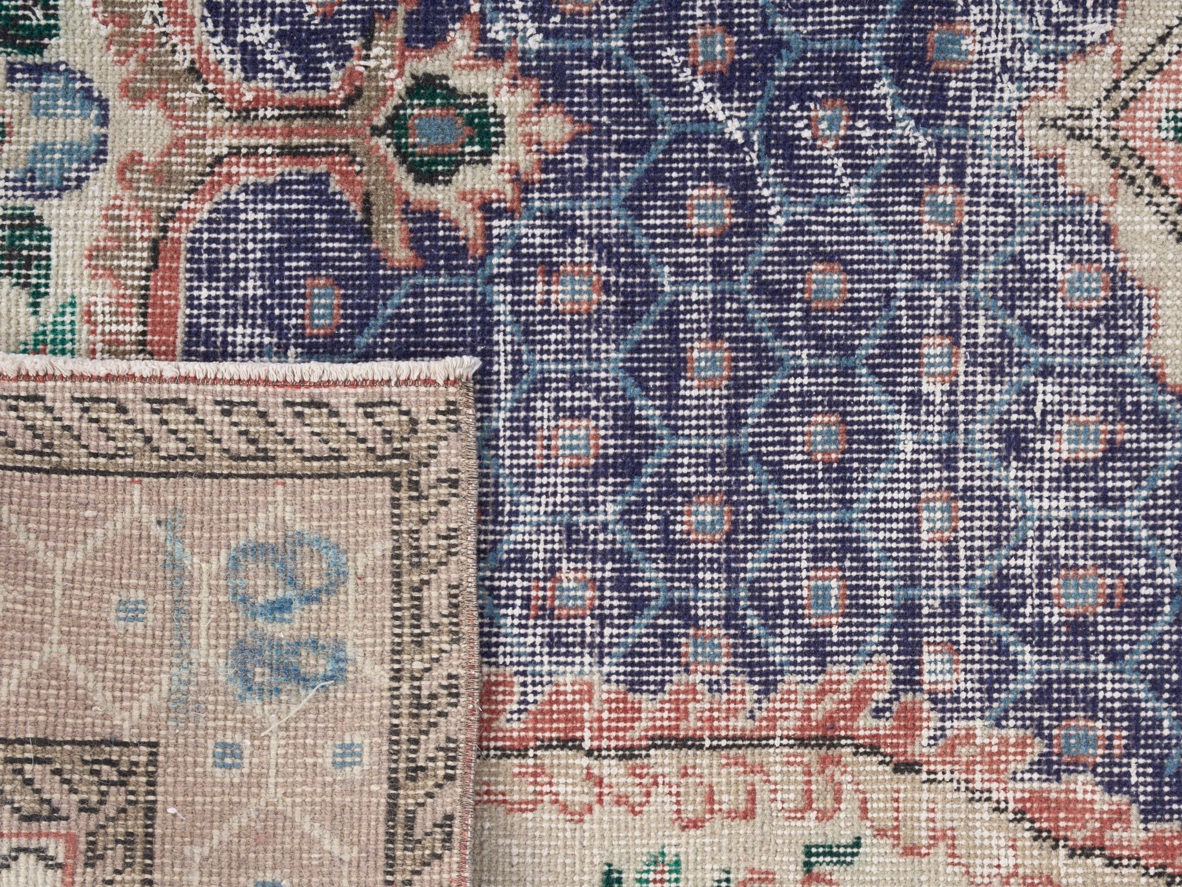 Turkish Isparta area rug in deep indigo and rose, view 10 of 10