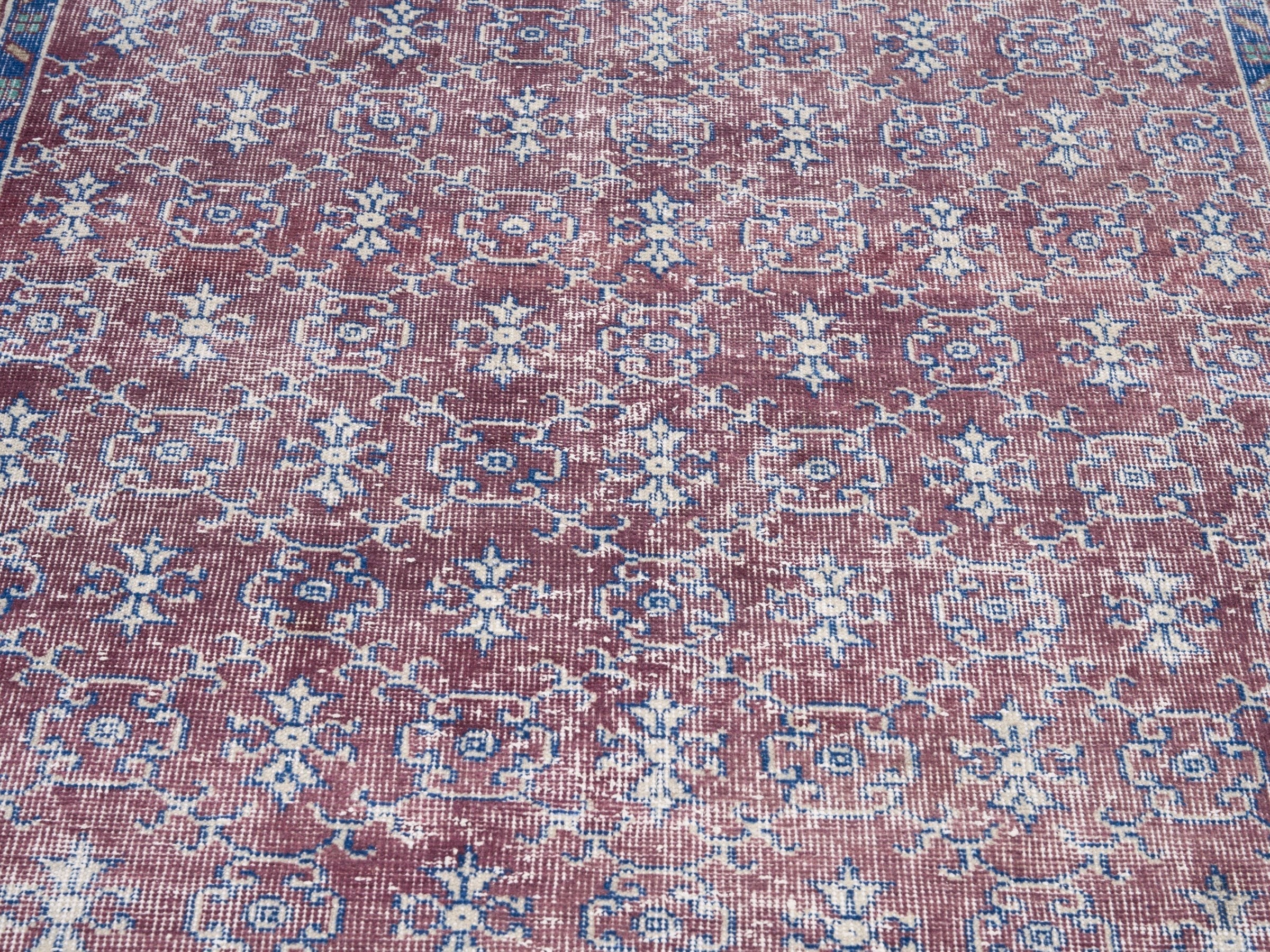 Turkish Isparta accent rug in faded red and denim, view 4 of 10