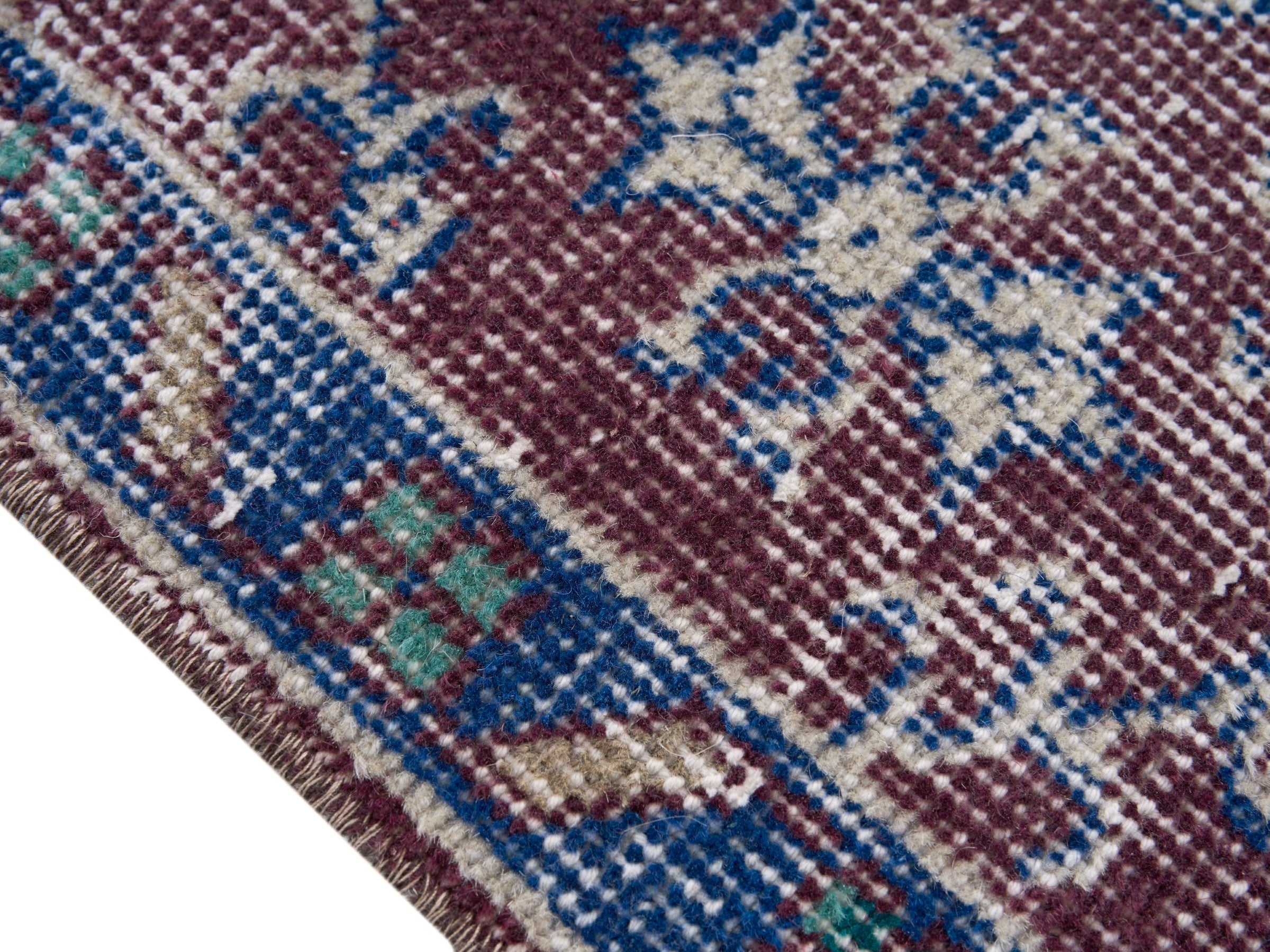 Turkish Isparta accent rug in faded red and denim, view 6 of 10