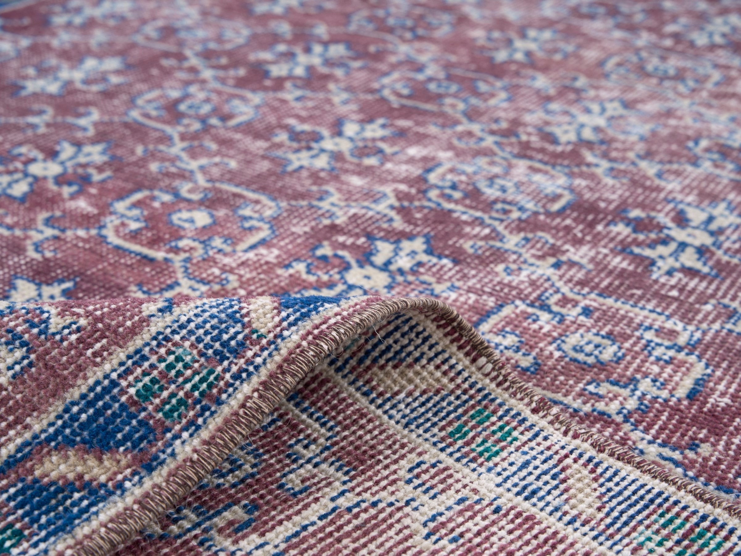 Turkish Isparta accent rug in faded red and denim, view 9 of 10
