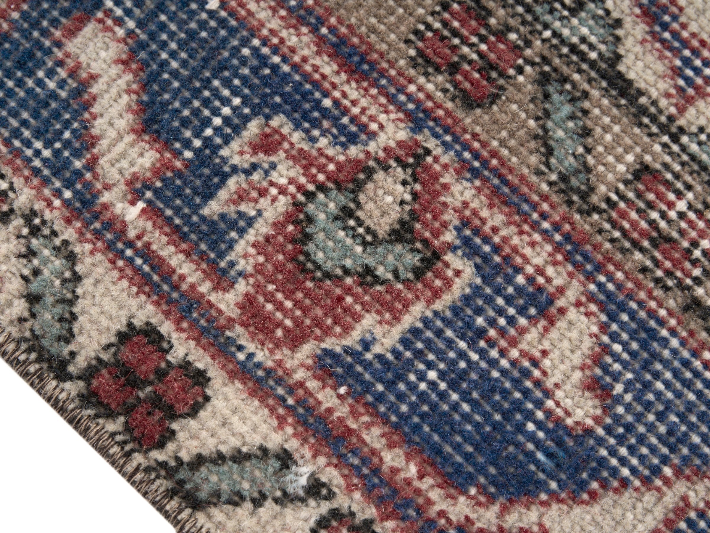 Turkish Isparta area rug in rose and navy, view 6 of 10