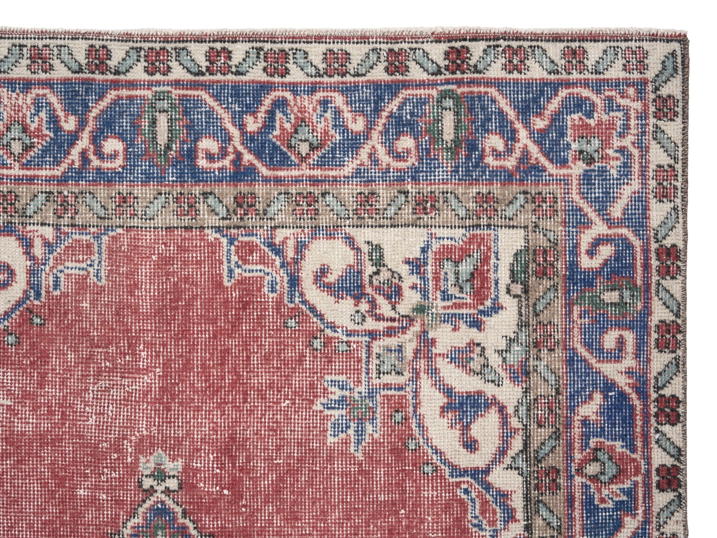Turkish Isparta area rug in rose and navy, view 8 of 10