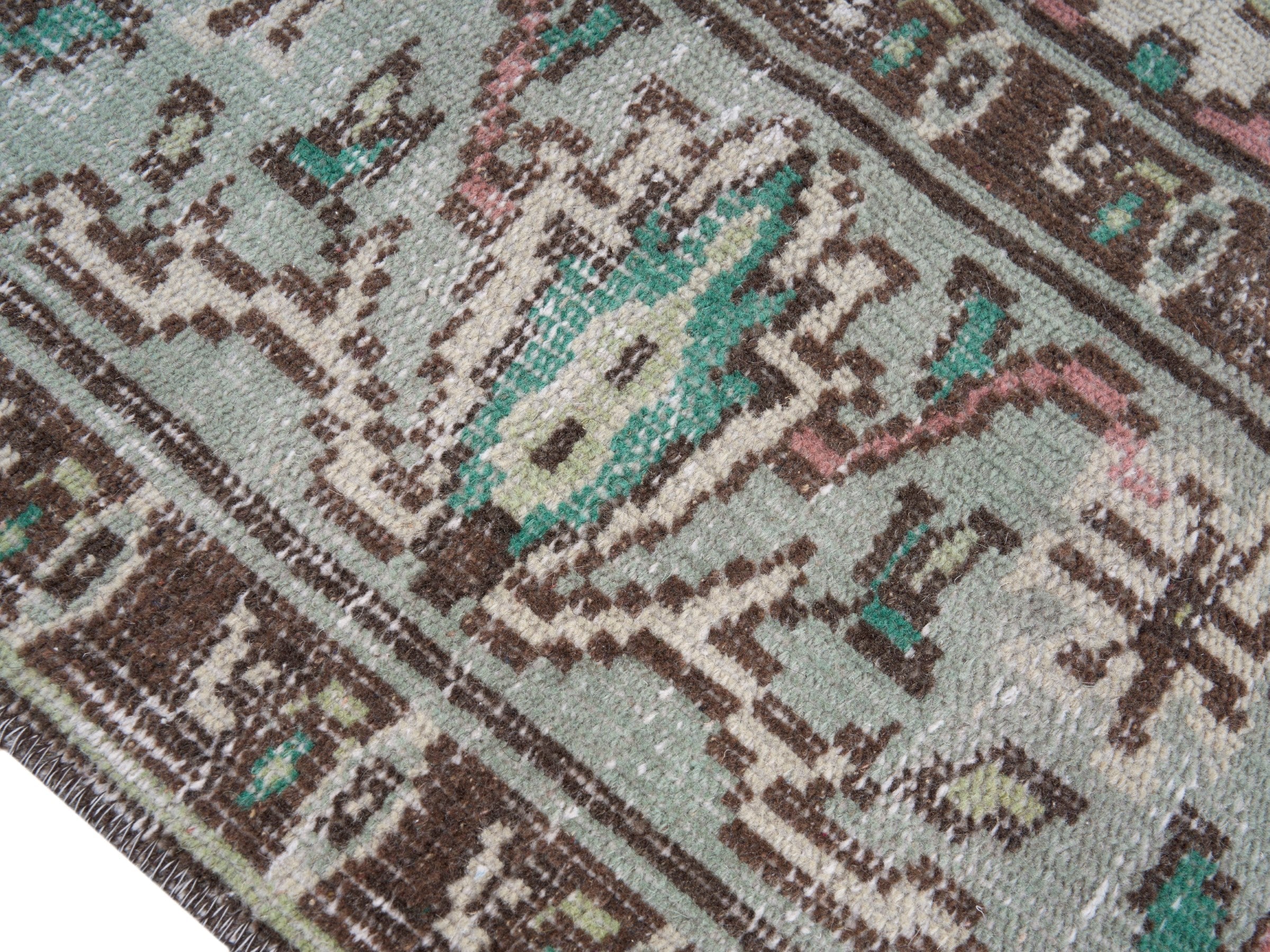 Turkish Manisa area rug in cream and teal, view 6 of 10