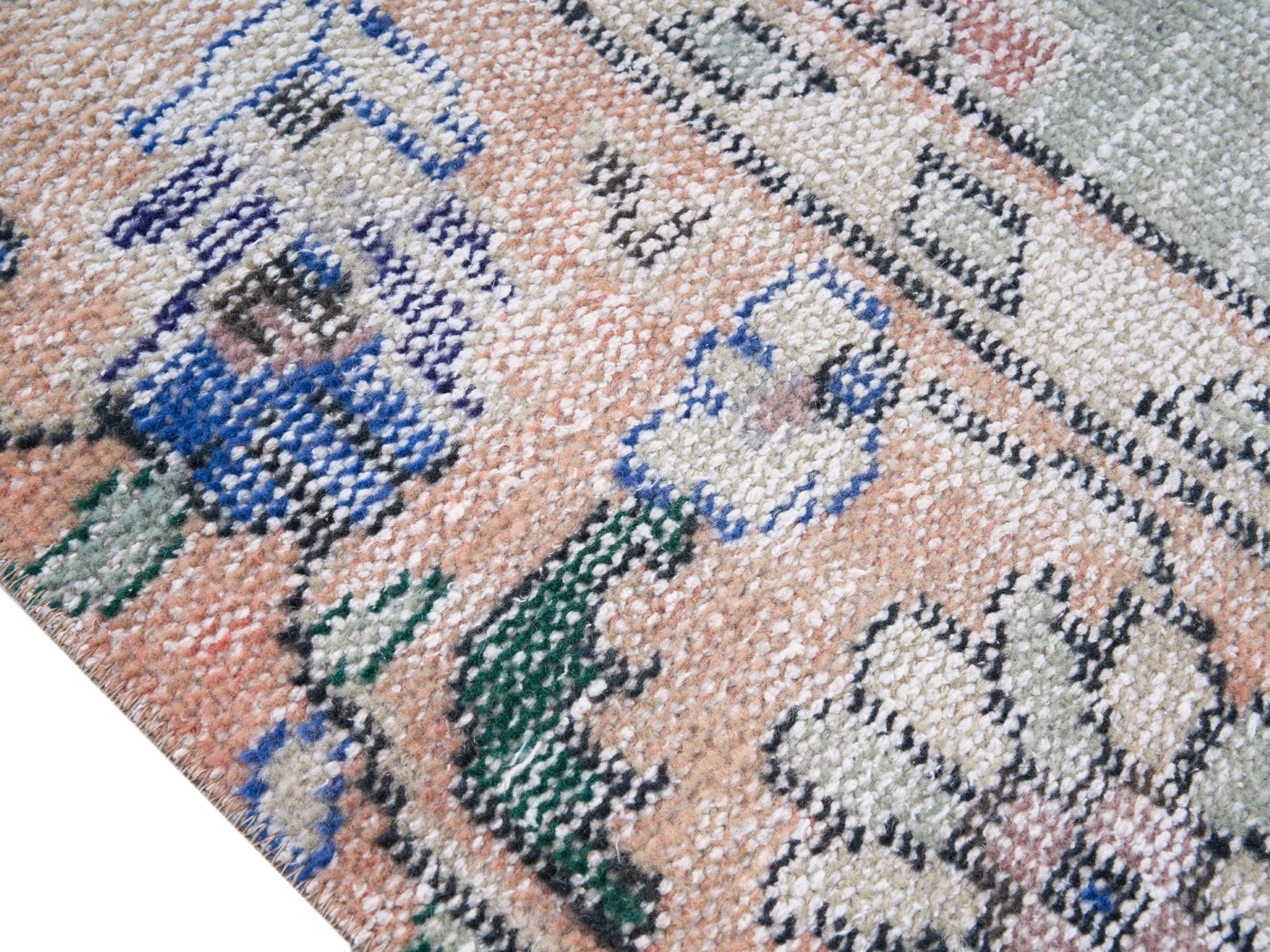 Turkish Manisa area rug in stone and denim, view 6 of 10