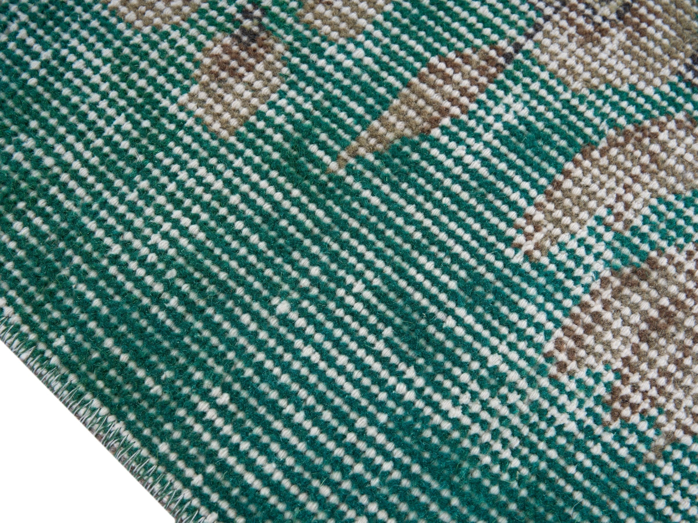 Turkish Isparta area rug in teal and muted pink, view 6 of 10