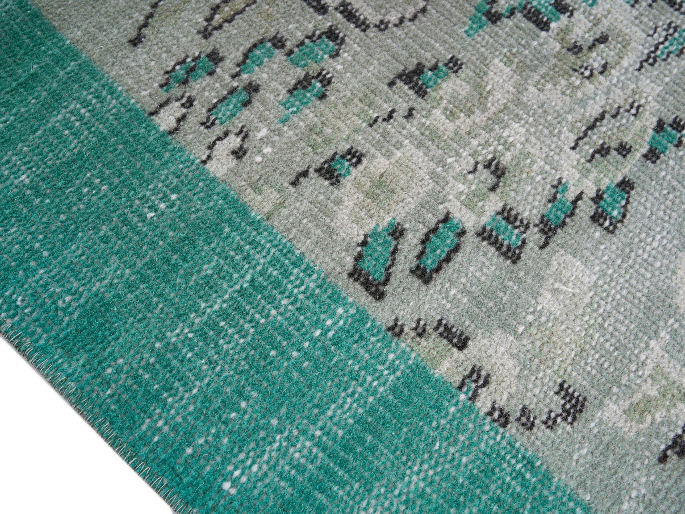Turkish Manisa area rug in cream and turquoise, view 6 of 10