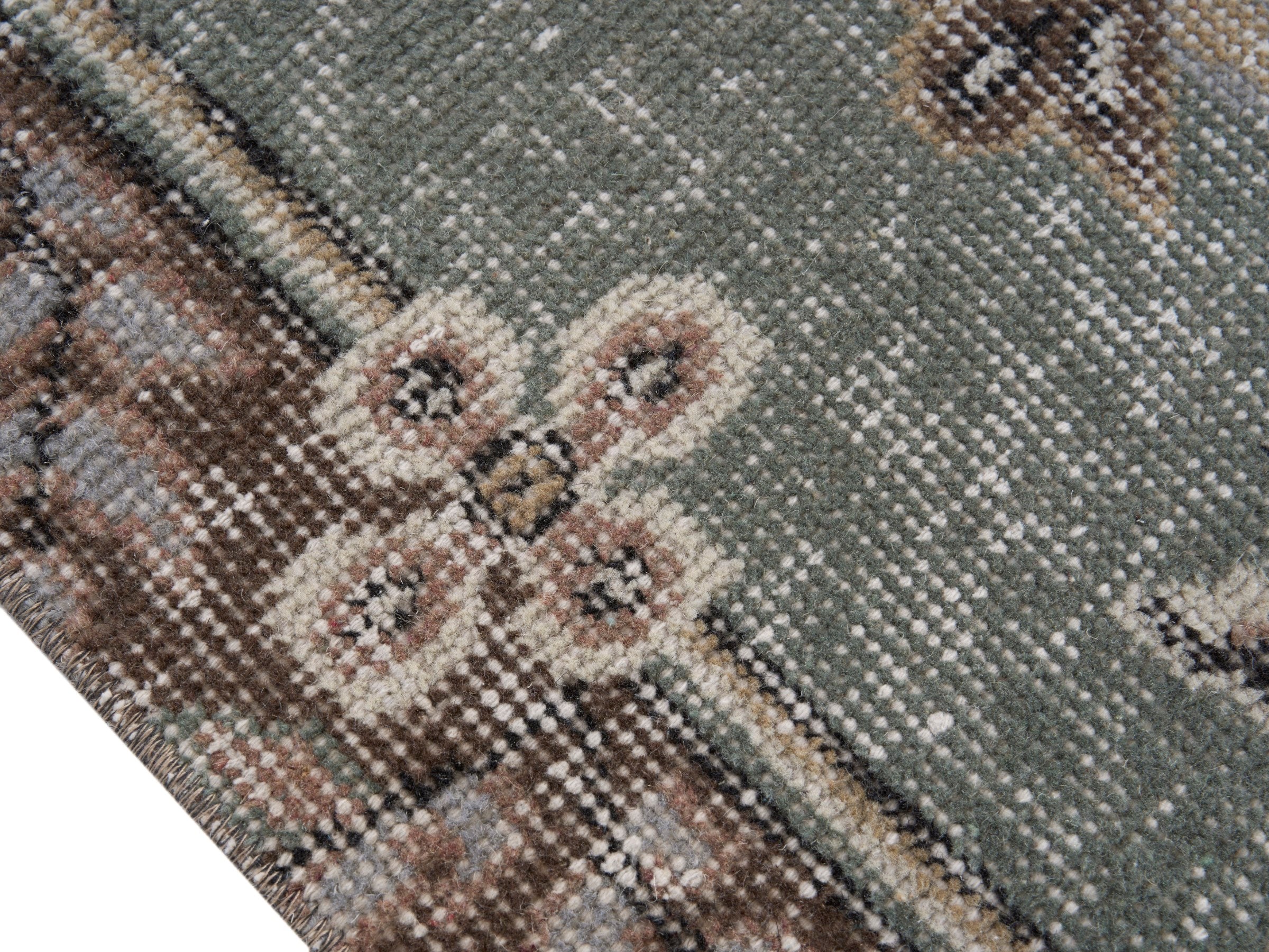 Turkish Isparta area rug in terracotta and sage, view 6 of 10