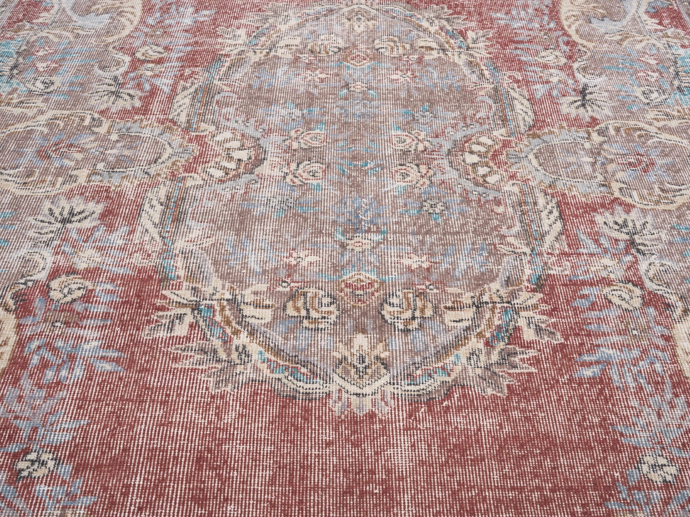 Turkish Isparta area rug in faded red and muted pink, view 4 of 10