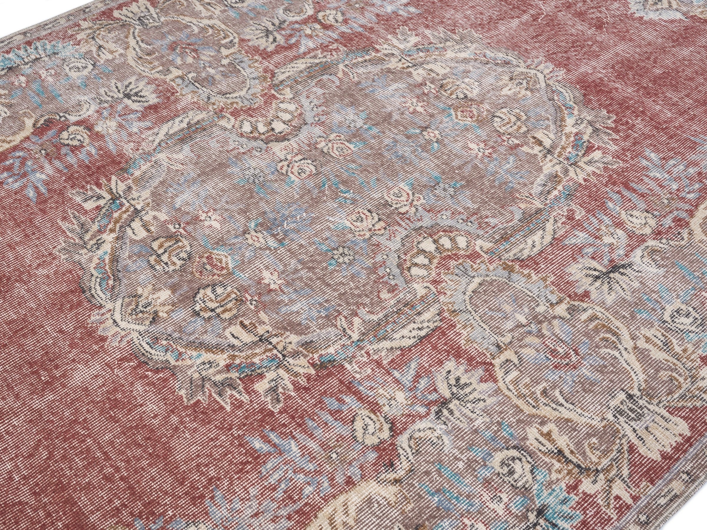 Turkish Isparta area rug in faded red and muted pink, view 5 of 10
