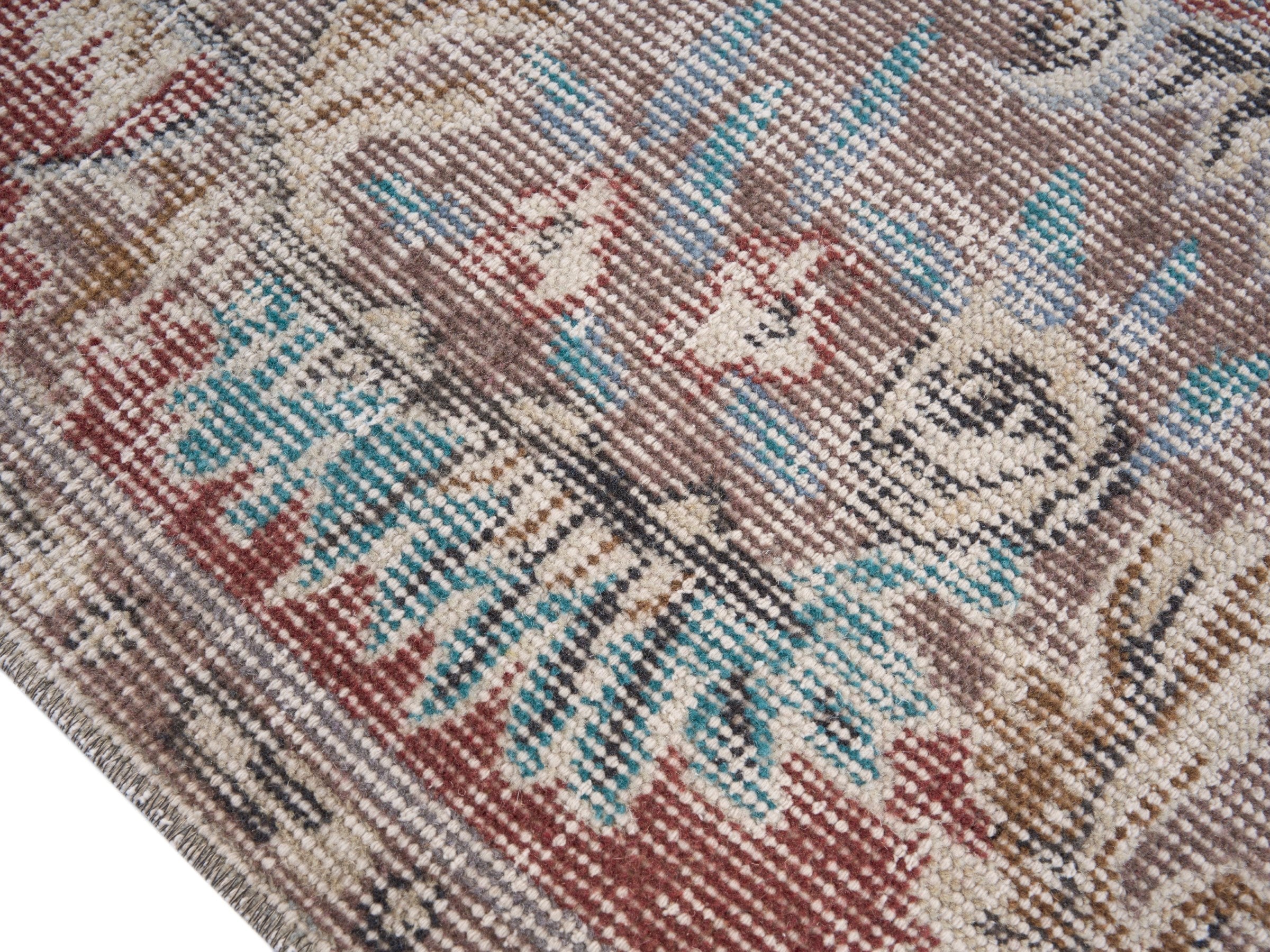 Turkish Isparta area rug in faded red and muted pink, view 6 of 10