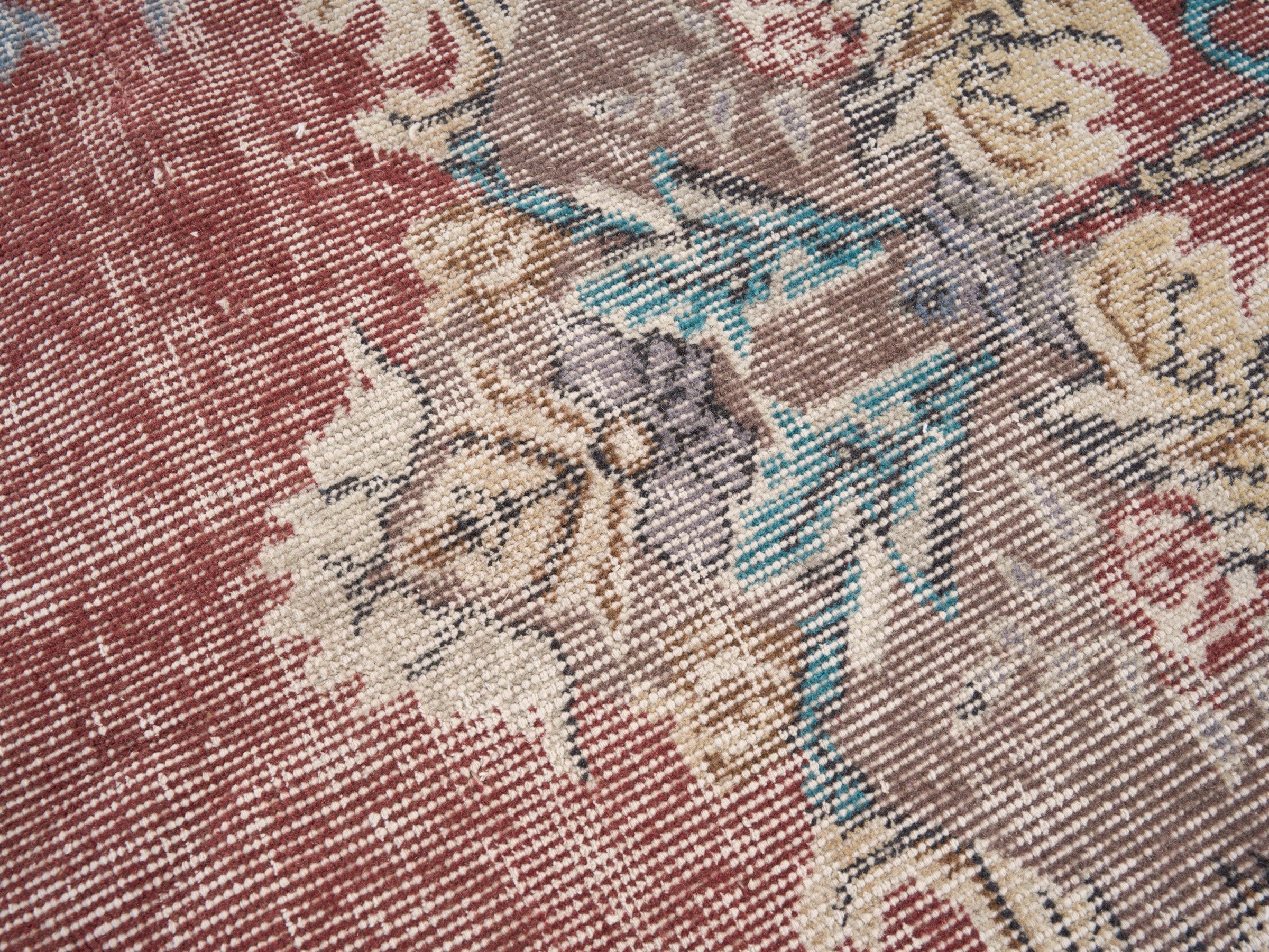 Turkish Isparta area rug in faded red and muted pink, view 7 of 10