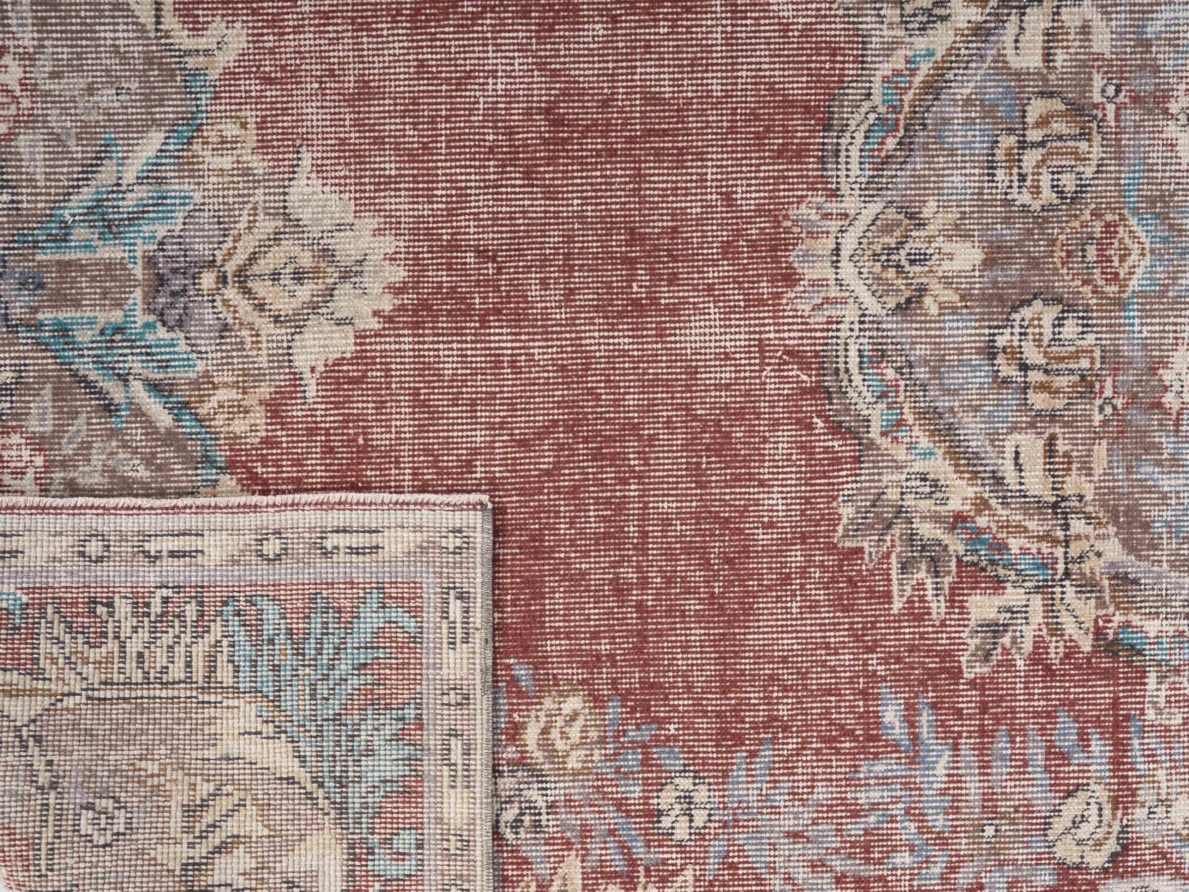 Turkish Isparta area rug in faded red and muted pink, view 10 of 10