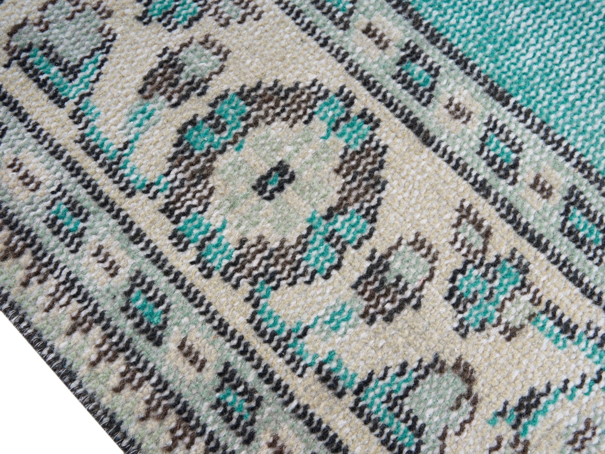 Turkish Manisa area rug in turquoise and cream, view 6 of 10