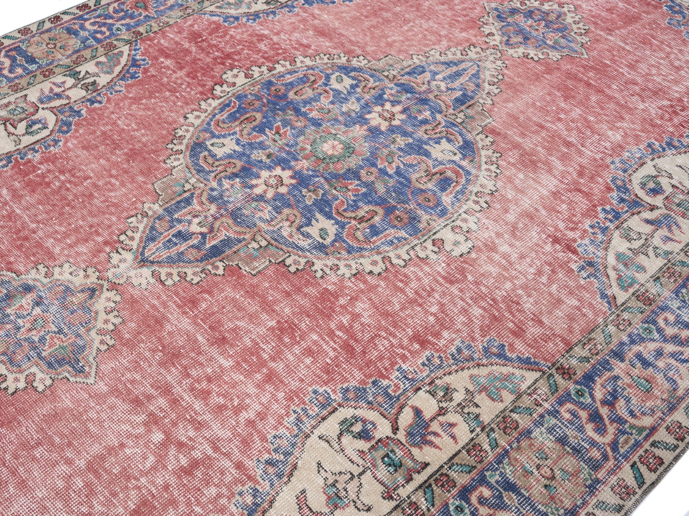Turkish Isparta area rug in dusty rose and navy, view 5 of 10