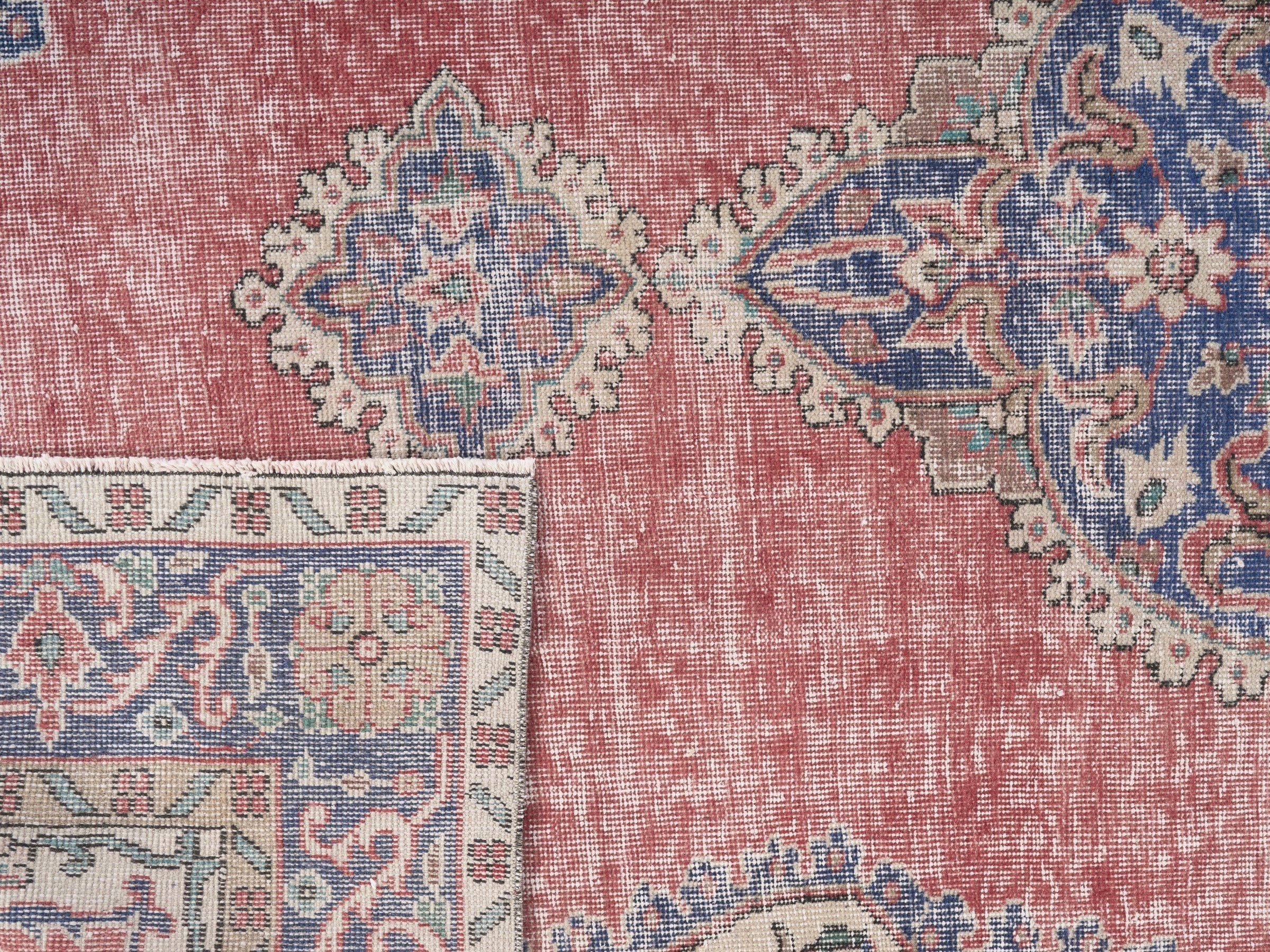 Turkish Isparta area rug in dusty rose and navy, view 10 of 10