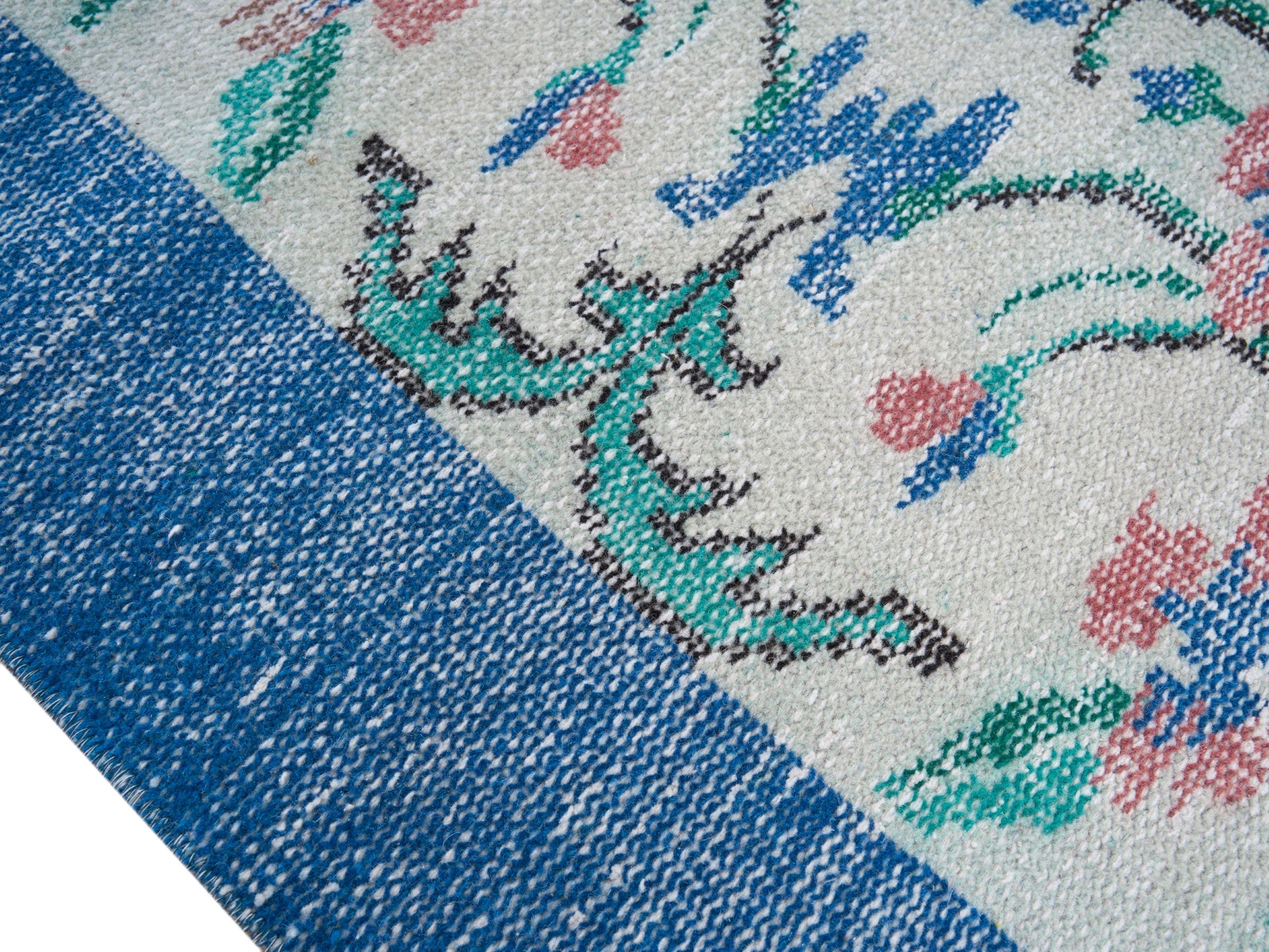 Turkish Manisa area rug in cream and denim, view 6 of 10