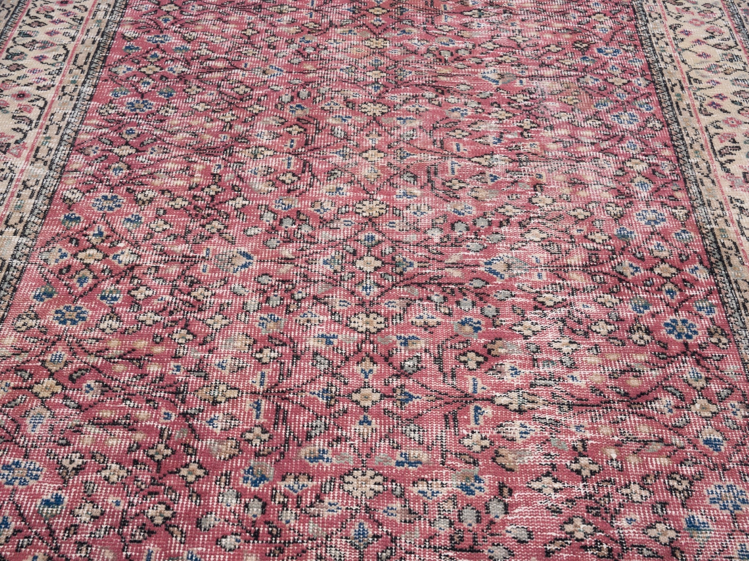 Turkish Isparta area rug in faded red and cream, view 4 of 10