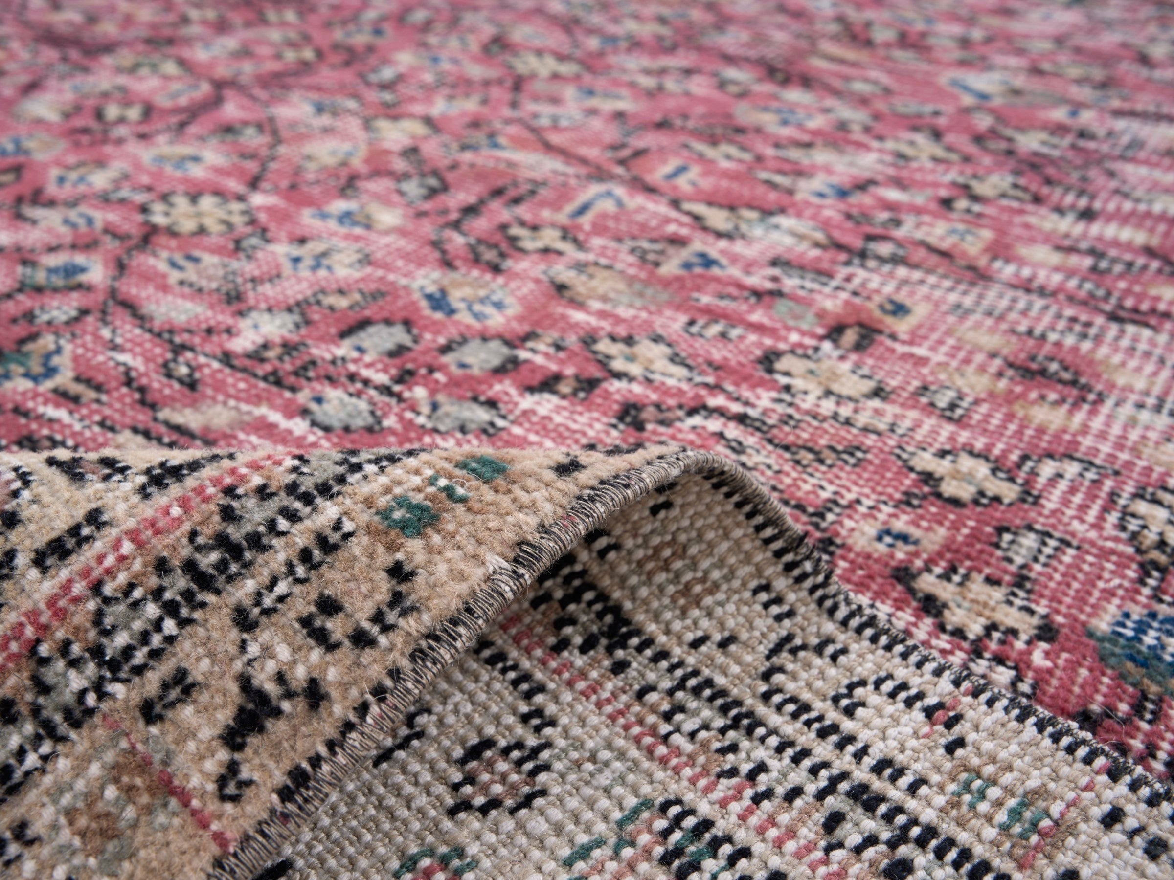 Turkish Isparta area rug in faded red and cream, view 9 of 10
