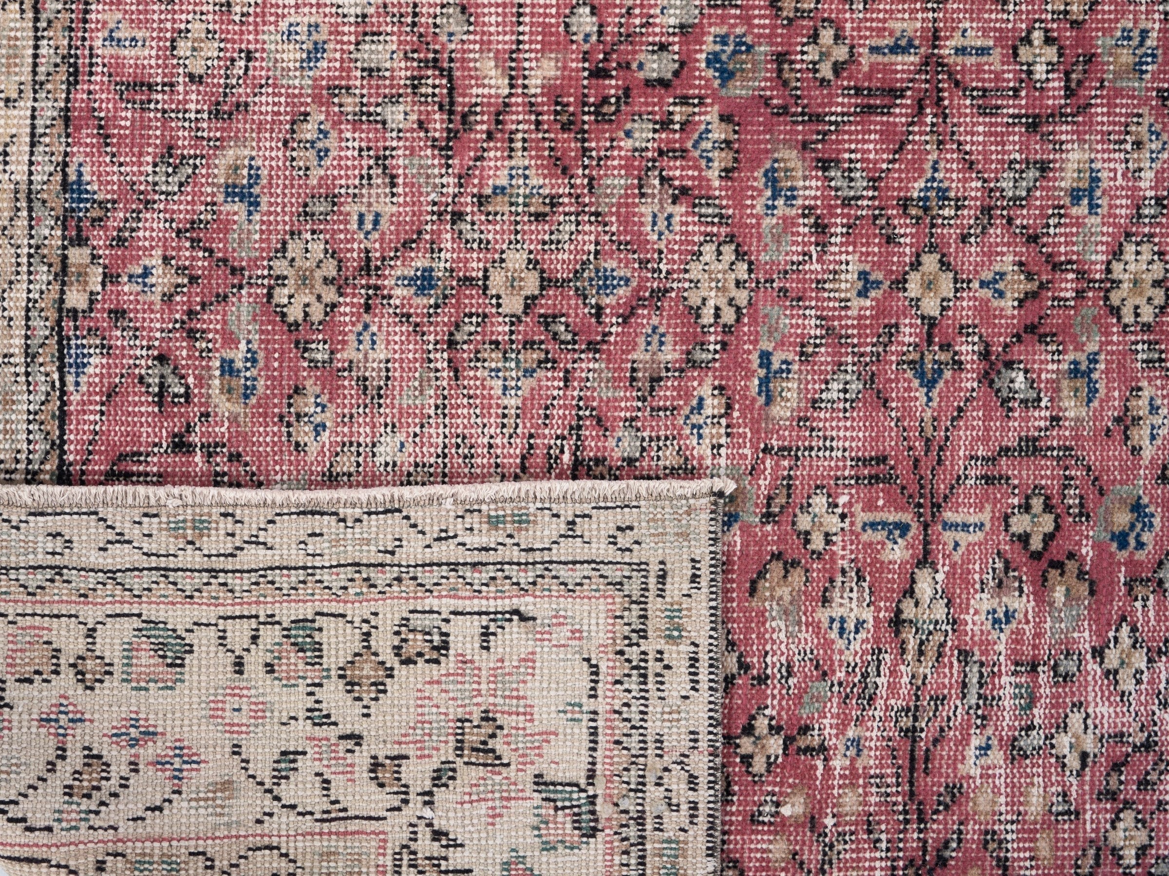 Turkish Isparta area rug in faded red and cream, view 10 of 10