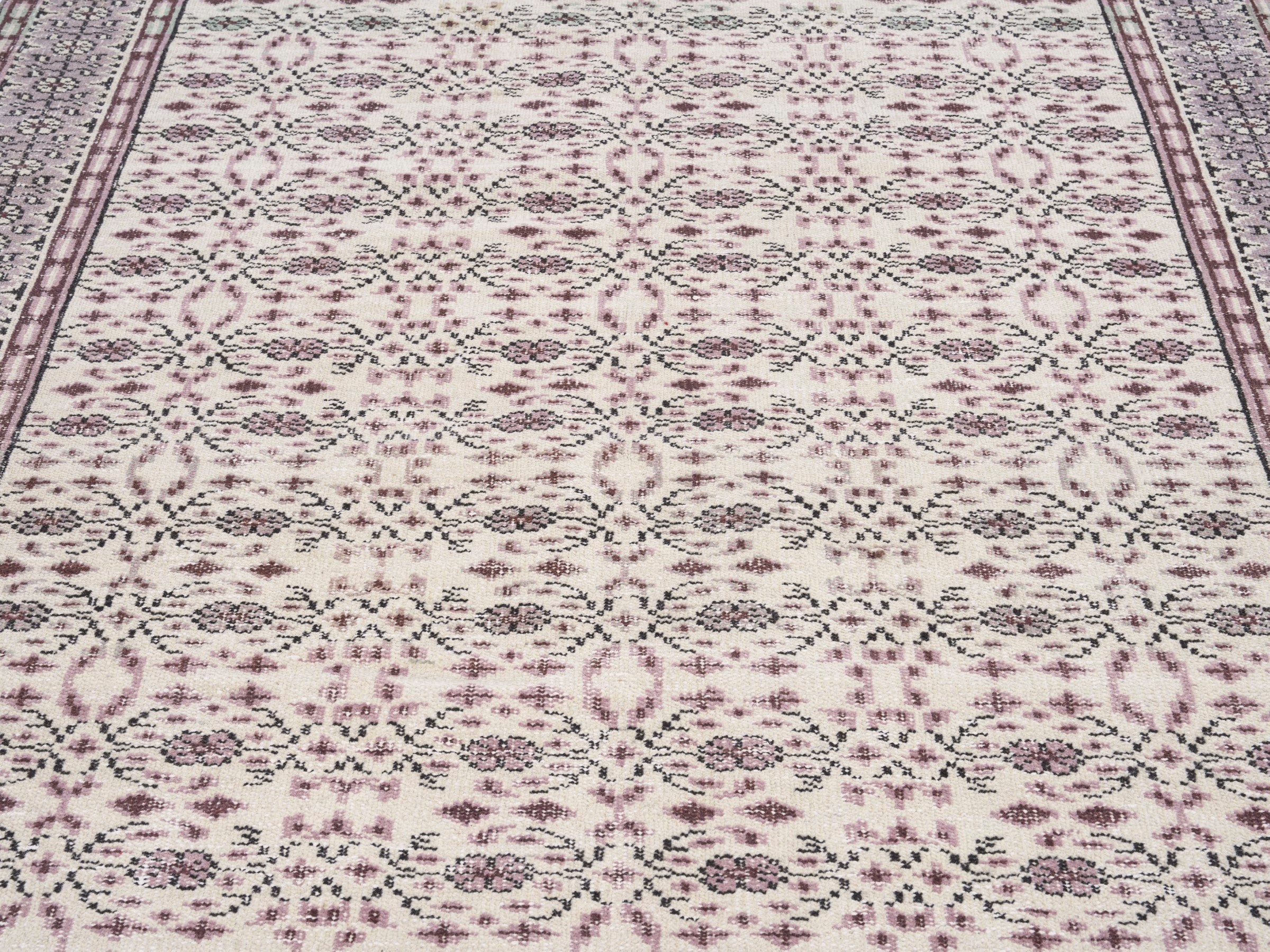 Turkish Manisa area rug in dusty rose and muted pink, view 4 of 10