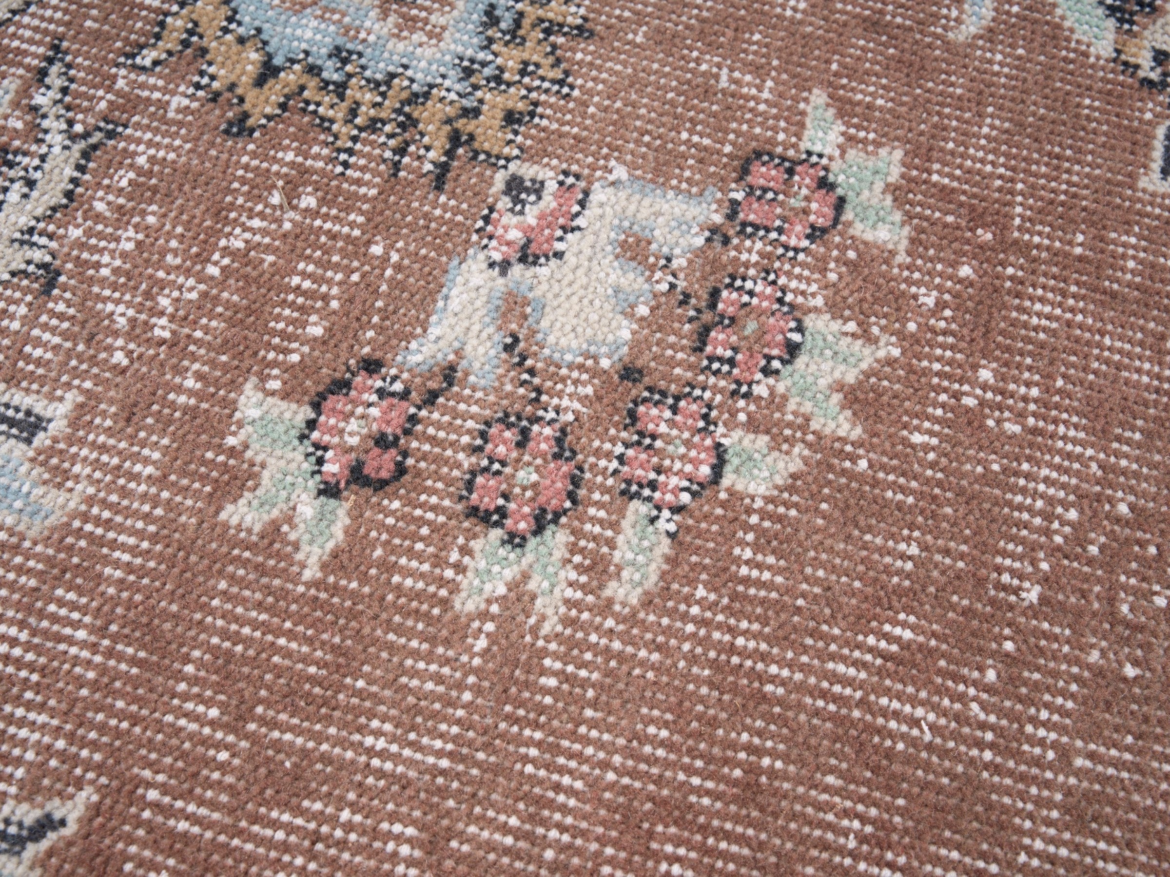Turkish Isparta area rug in dusty rose and muted pink, view 7 of 10