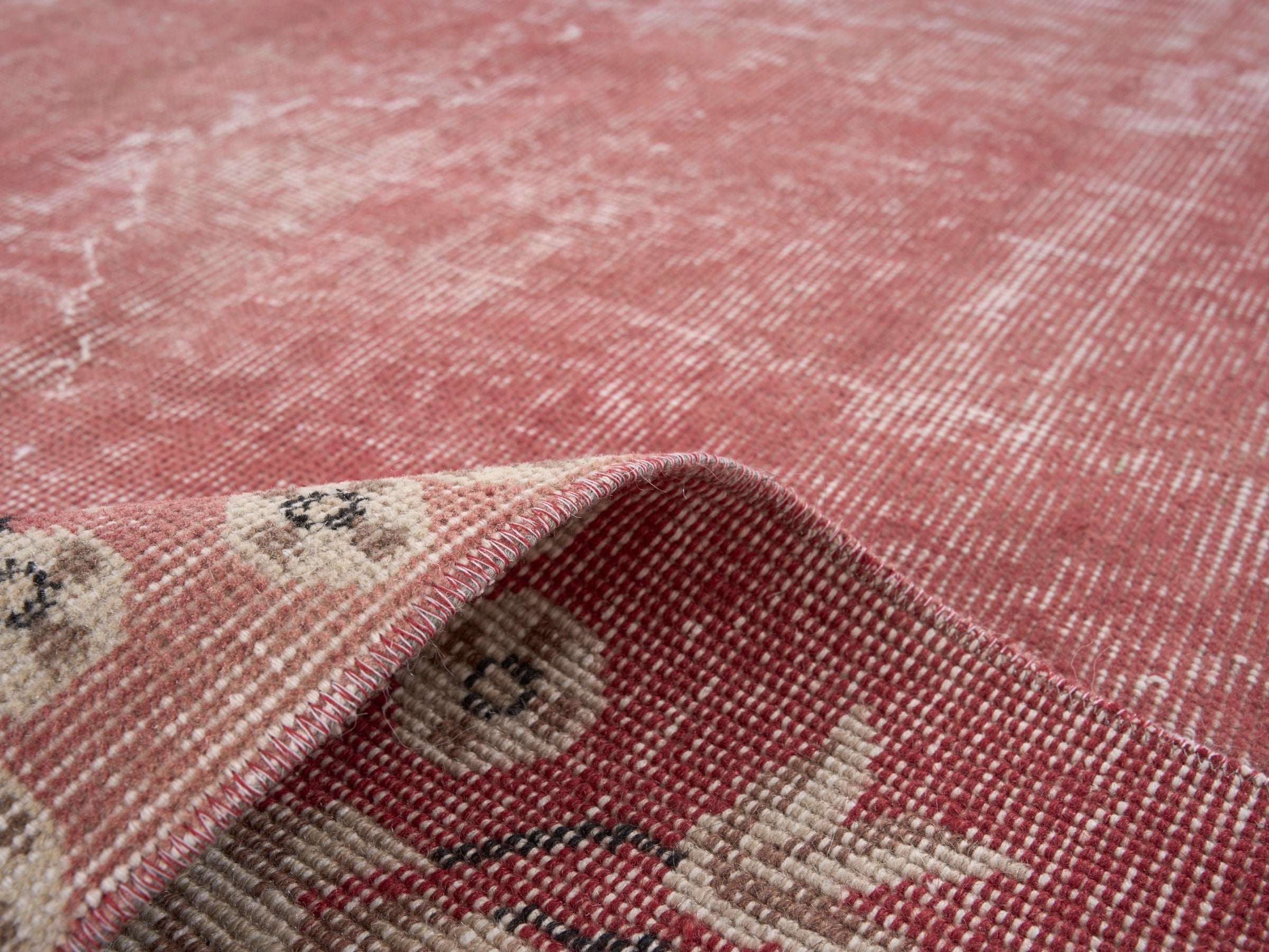 Turkish Isparta area rug in faded red and muted pink, view 9 of 10