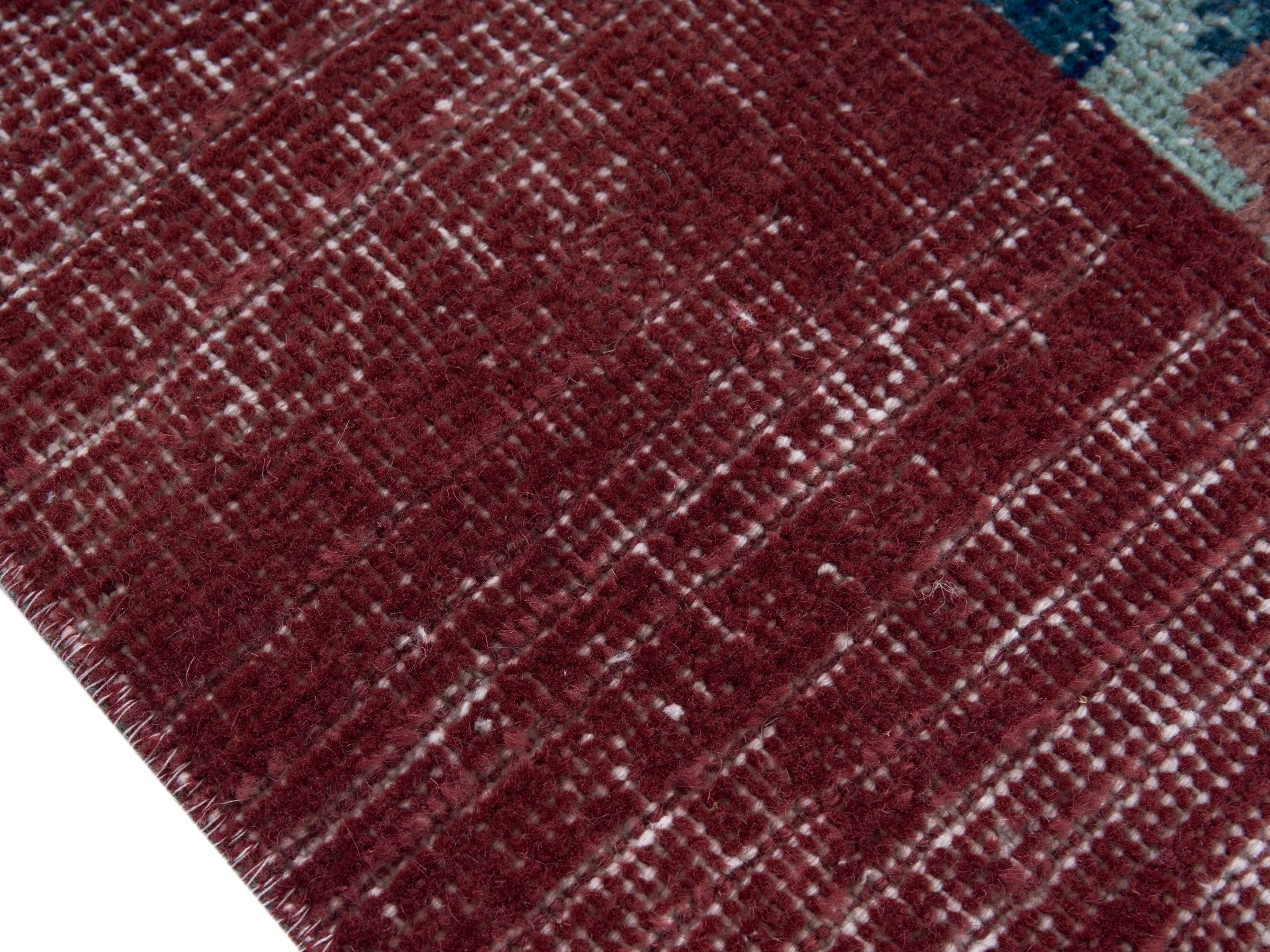 Turkish Isparta area rug in powder blue and burgundy, view 6 of 10