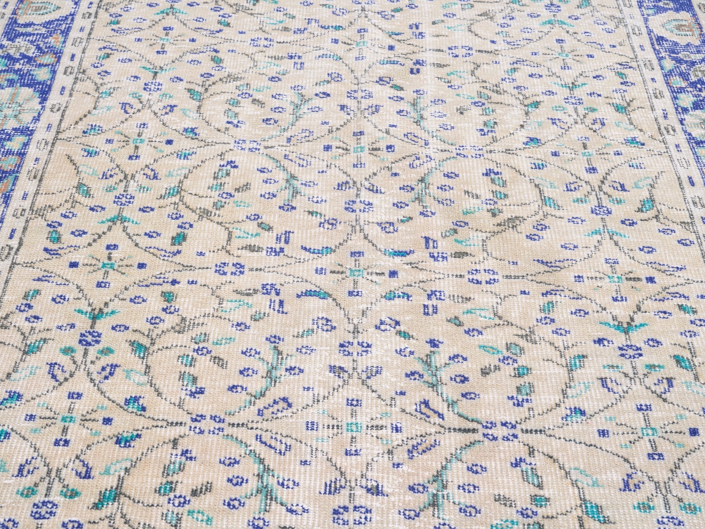 Turkish Manisa area rug in cream and navy, view 4 of 10