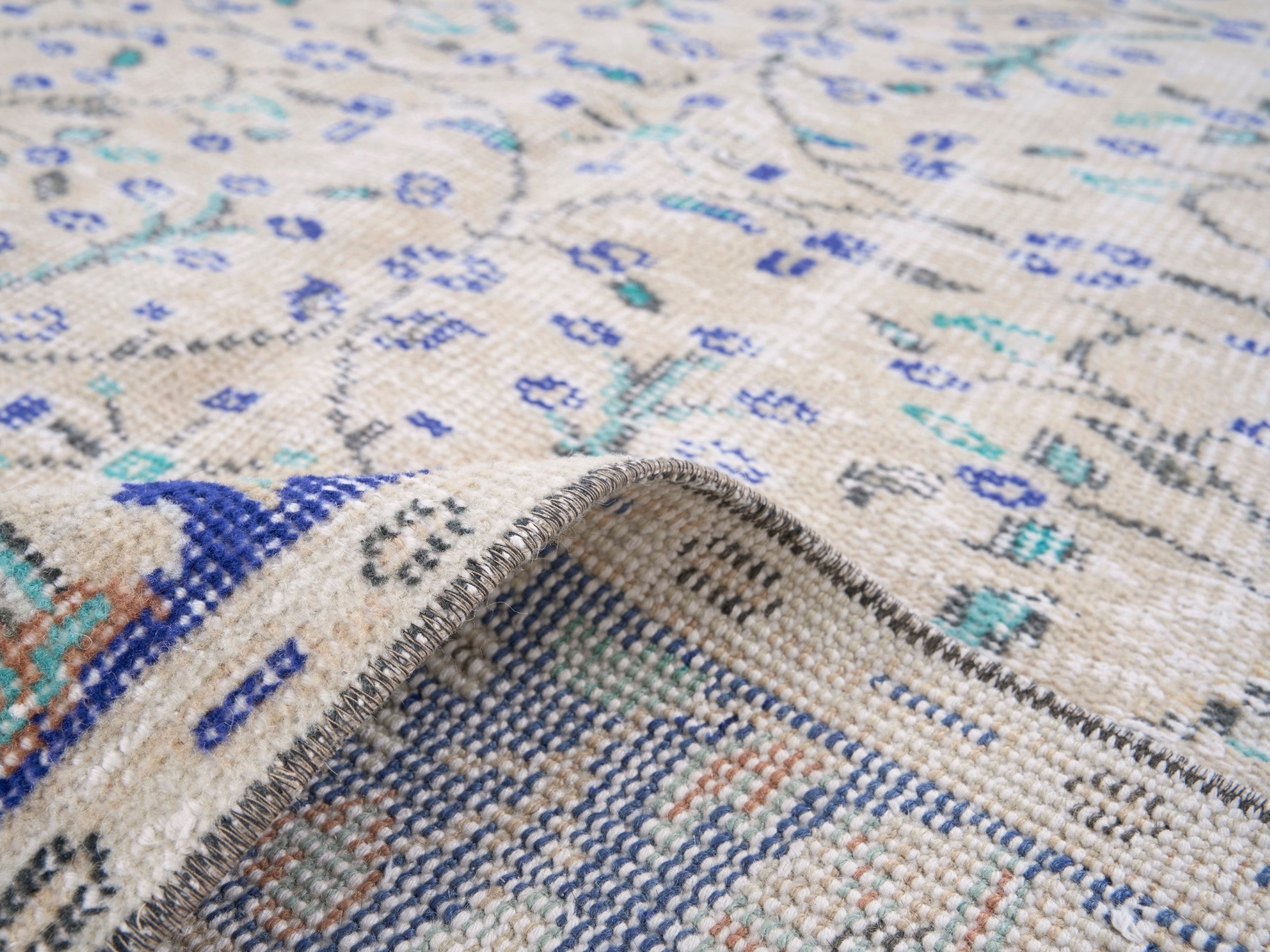 Turkish Manisa area rug in cream and navy, view 9 of 10
