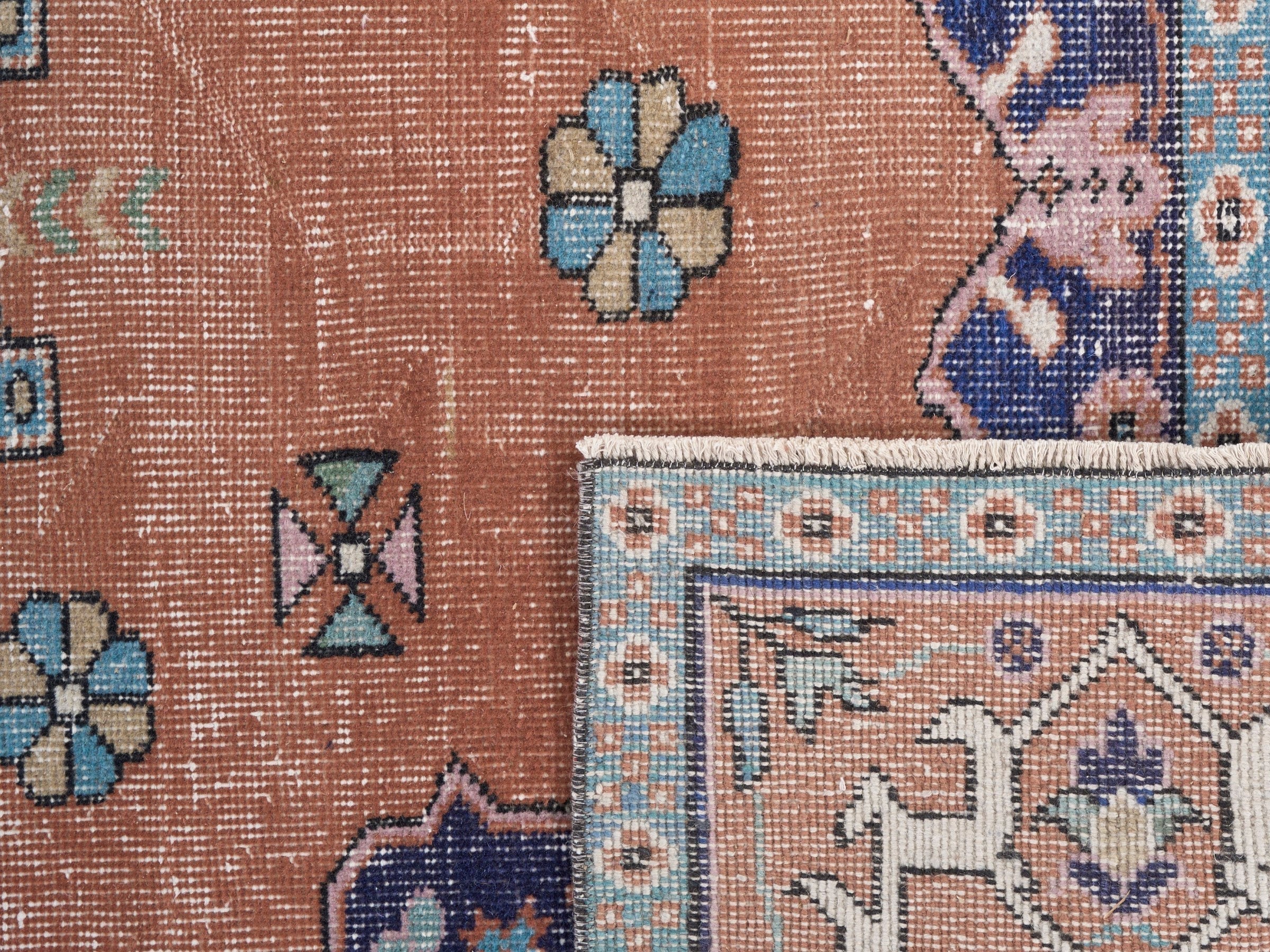 Turkish Isparta area rug in rust and navy, view 10 of 10