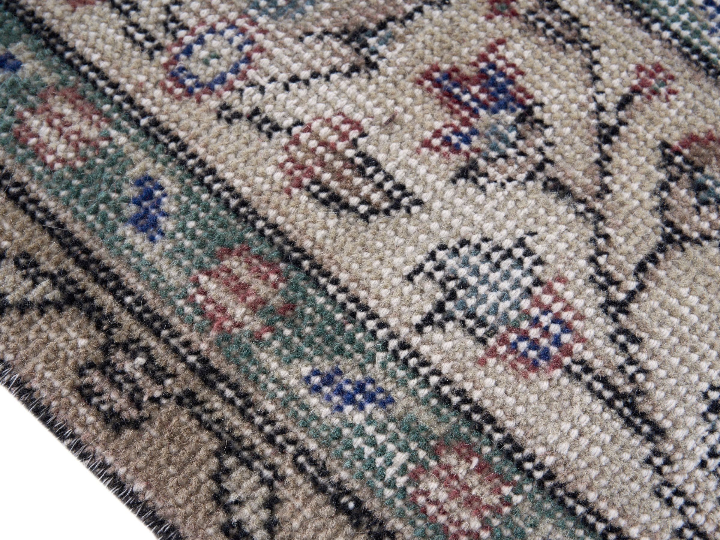 Turkish Isparta area rug in faded red and cream, view 6 of 10