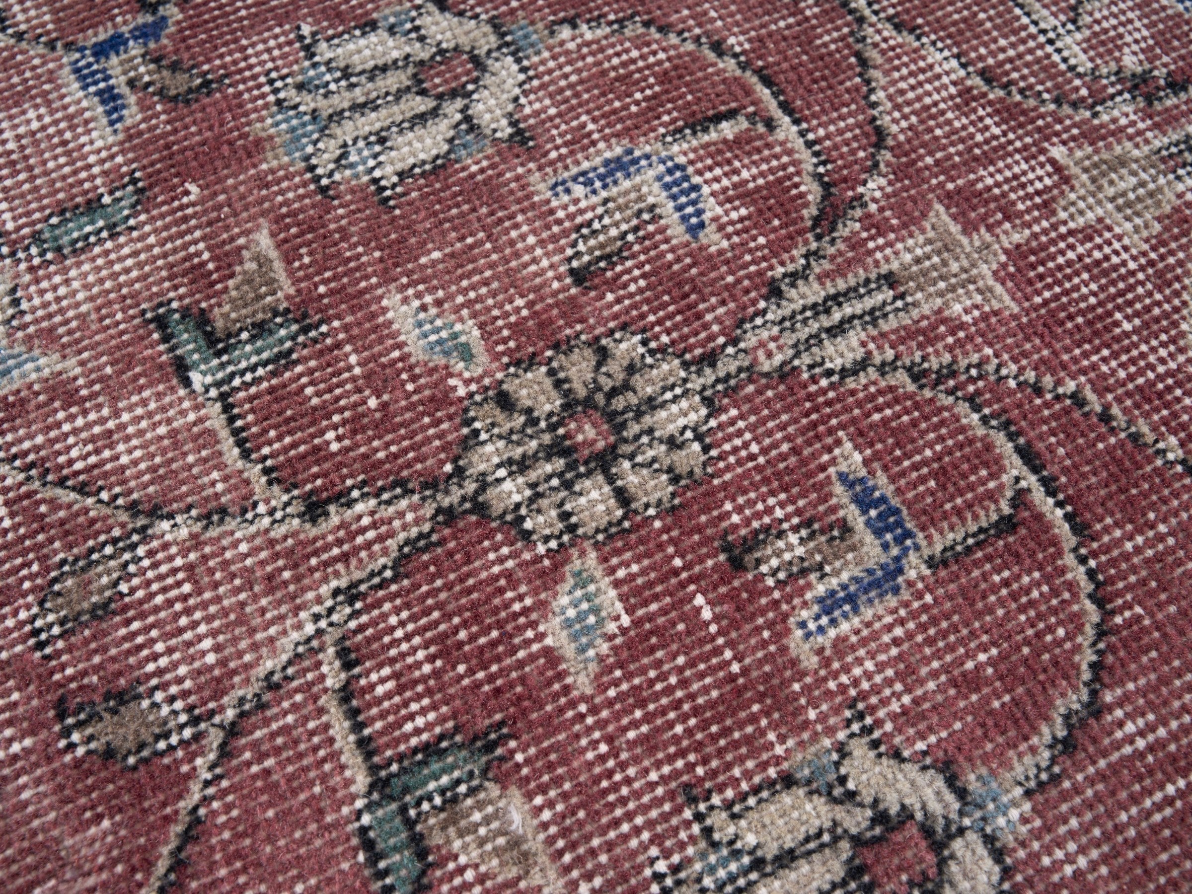 Turkish Isparta area rug in faded red and cream, view 7 of 10