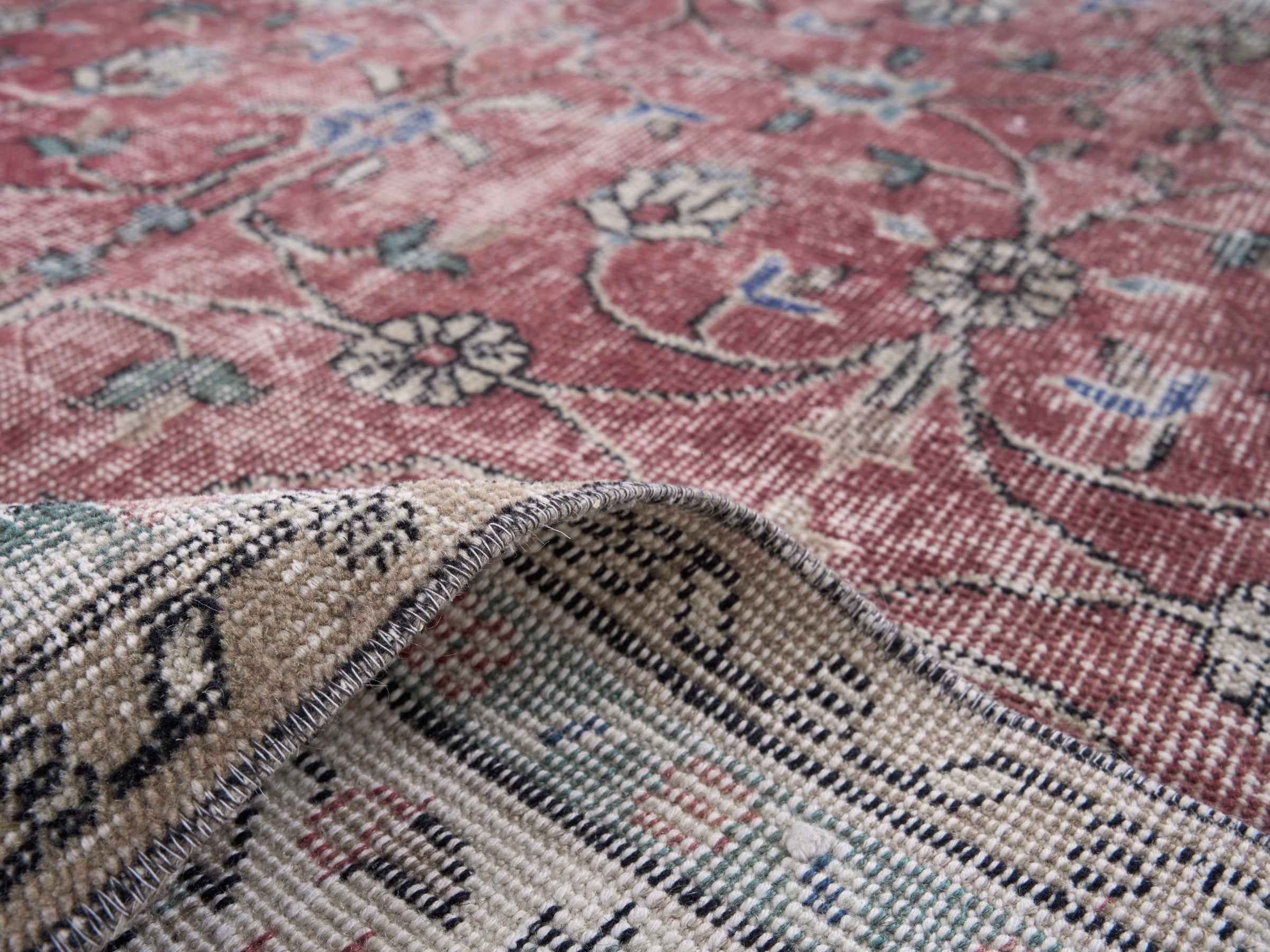 Turkish Isparta area rug in faded red and cream, view 9 of 10