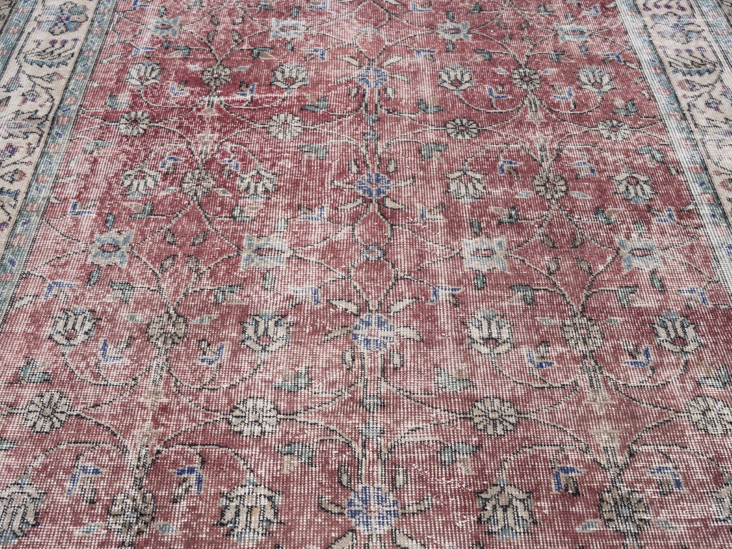 Turkish Isparta area rug in faded red and cream, view 4 of 10