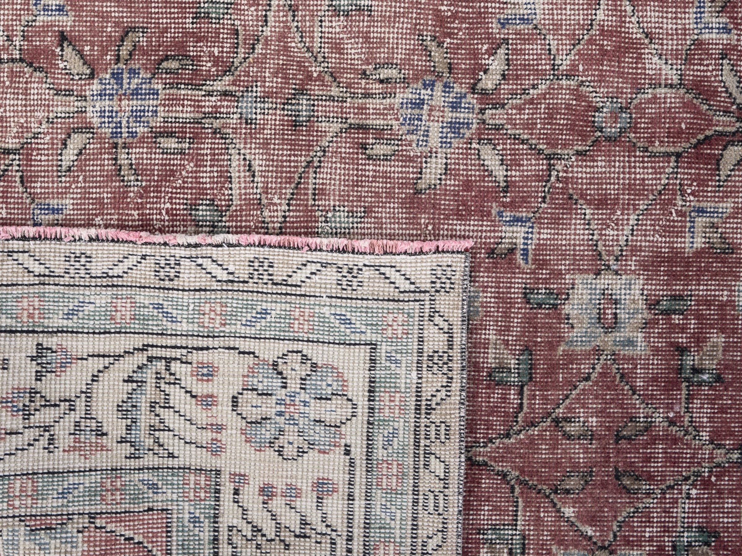 Turkish Isparta area rug in faded red and cream, view 10 of 10