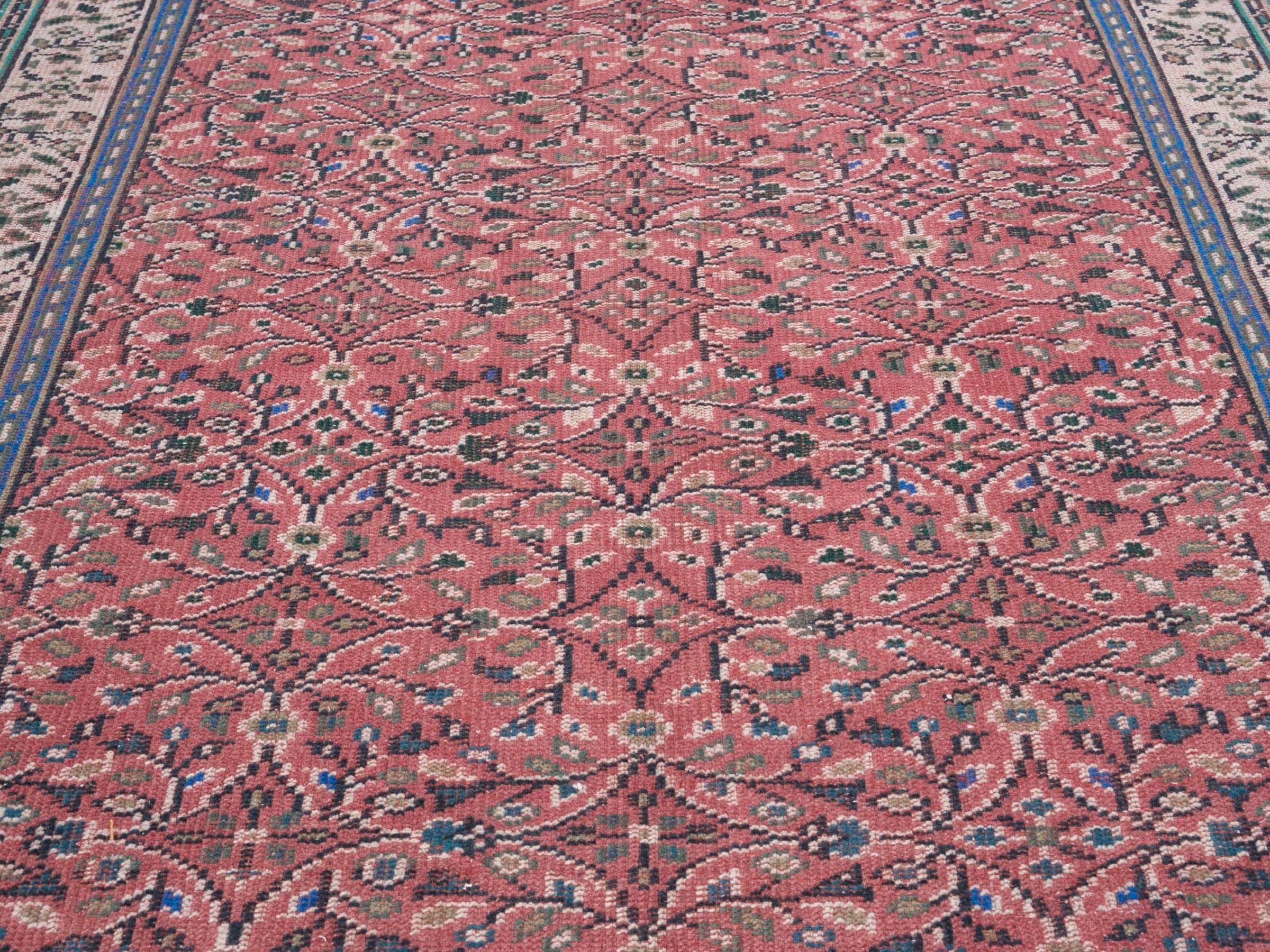 Turkish Manisa area rug in rust and muted pink, view 4 of 10