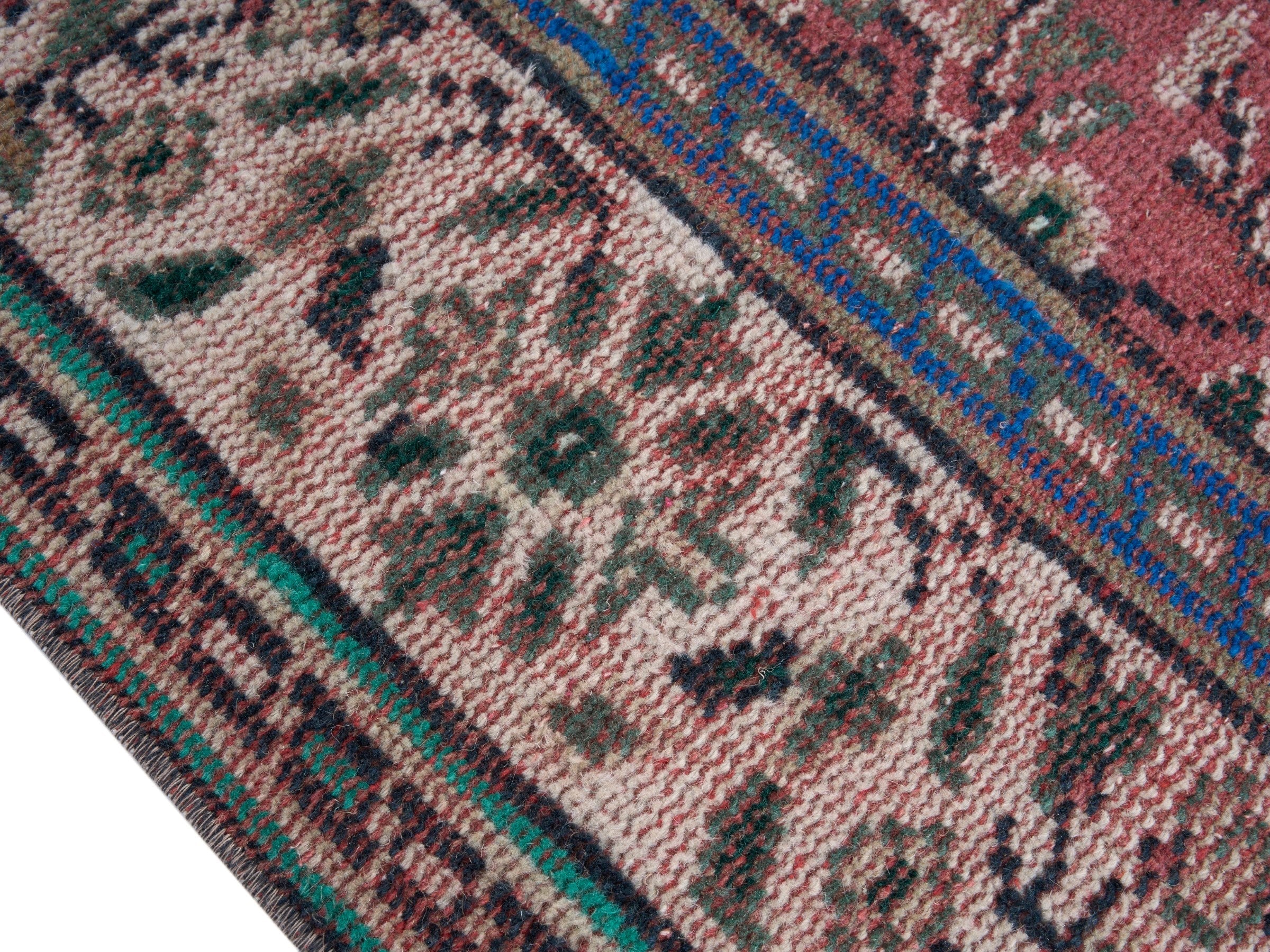 Turkish Manisa area rug in rust and muted pink, view 6 of 10