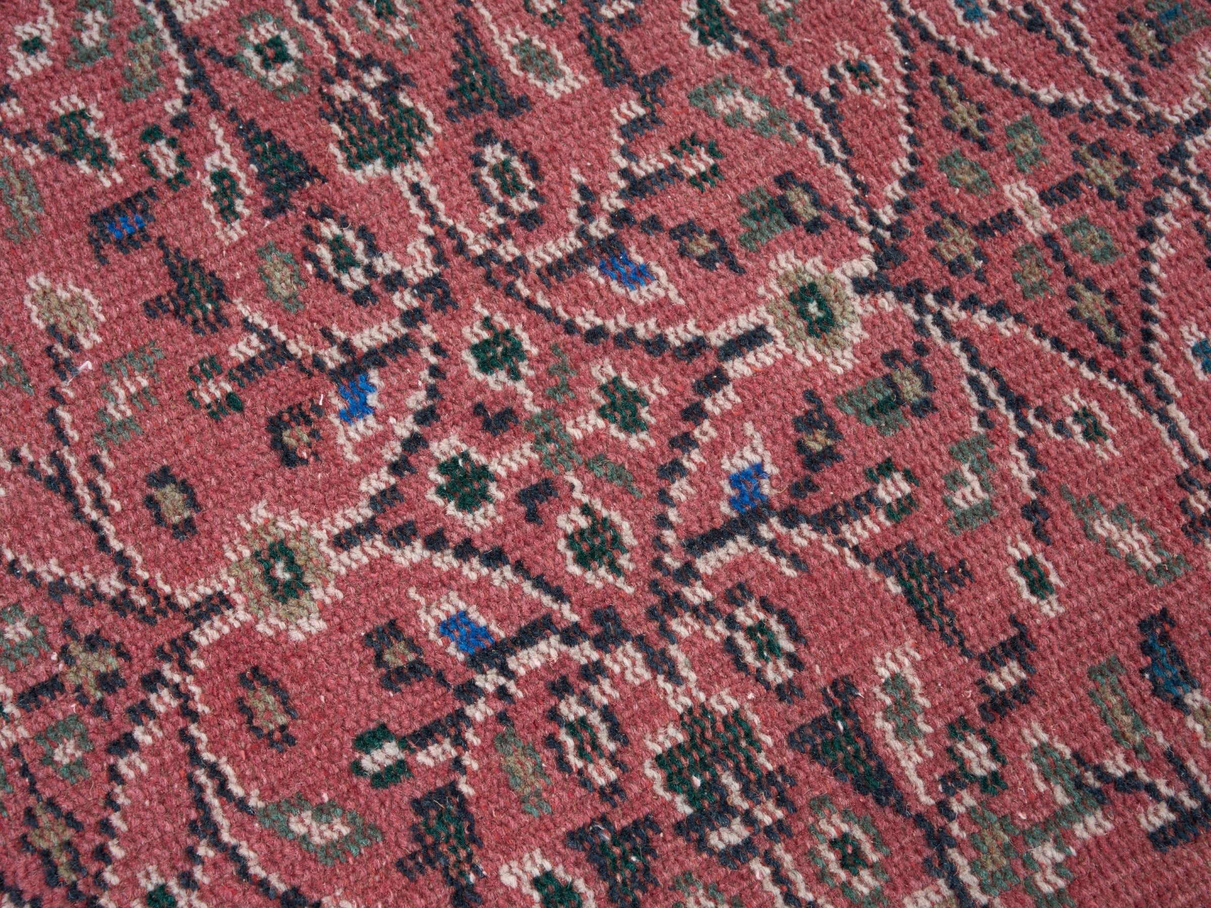 Turkish Manisa area rug in rust and muted pink, view 7 of 10