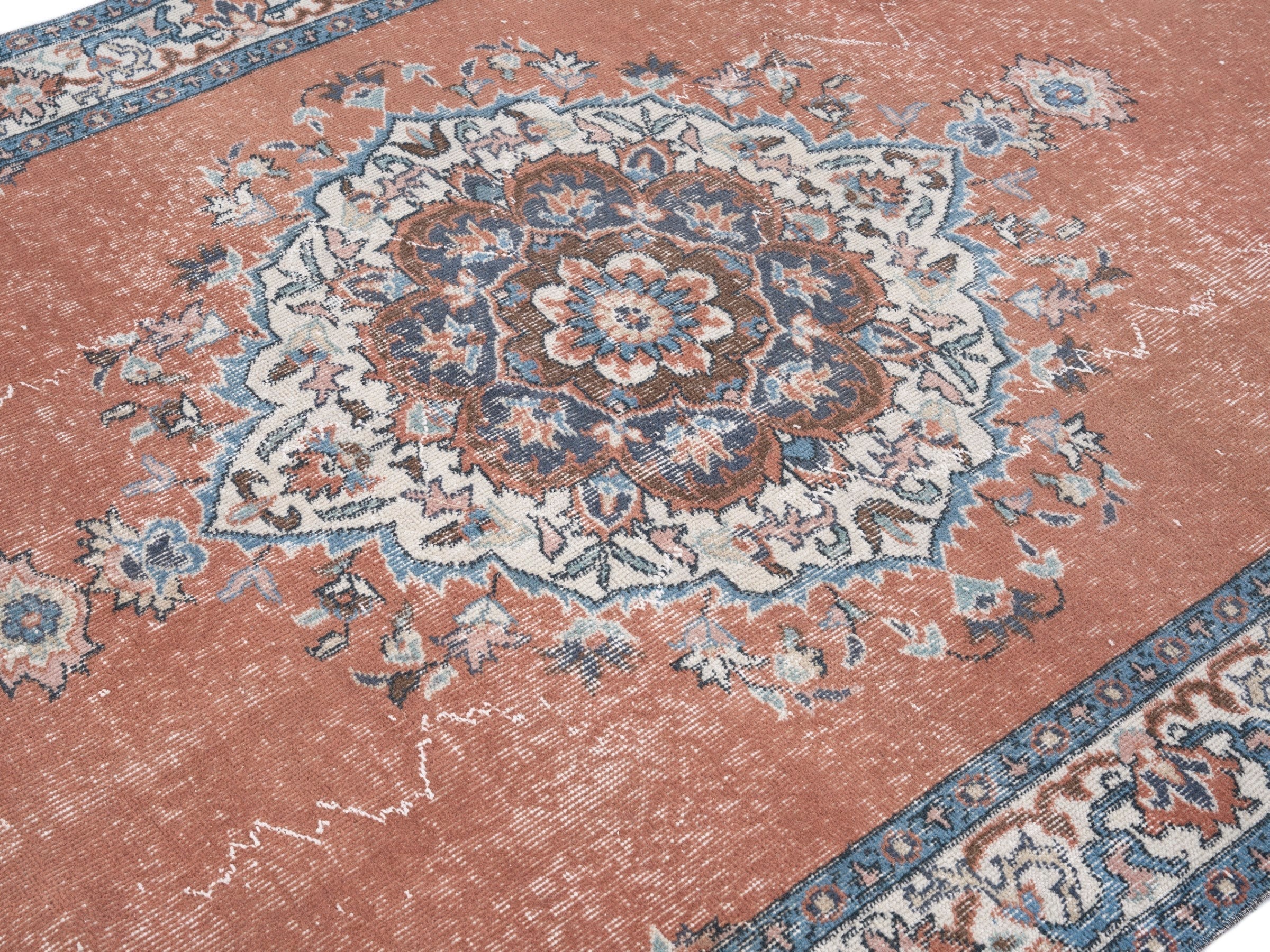 Turkish Isparta area rug in rust and navy, view 5 of 10