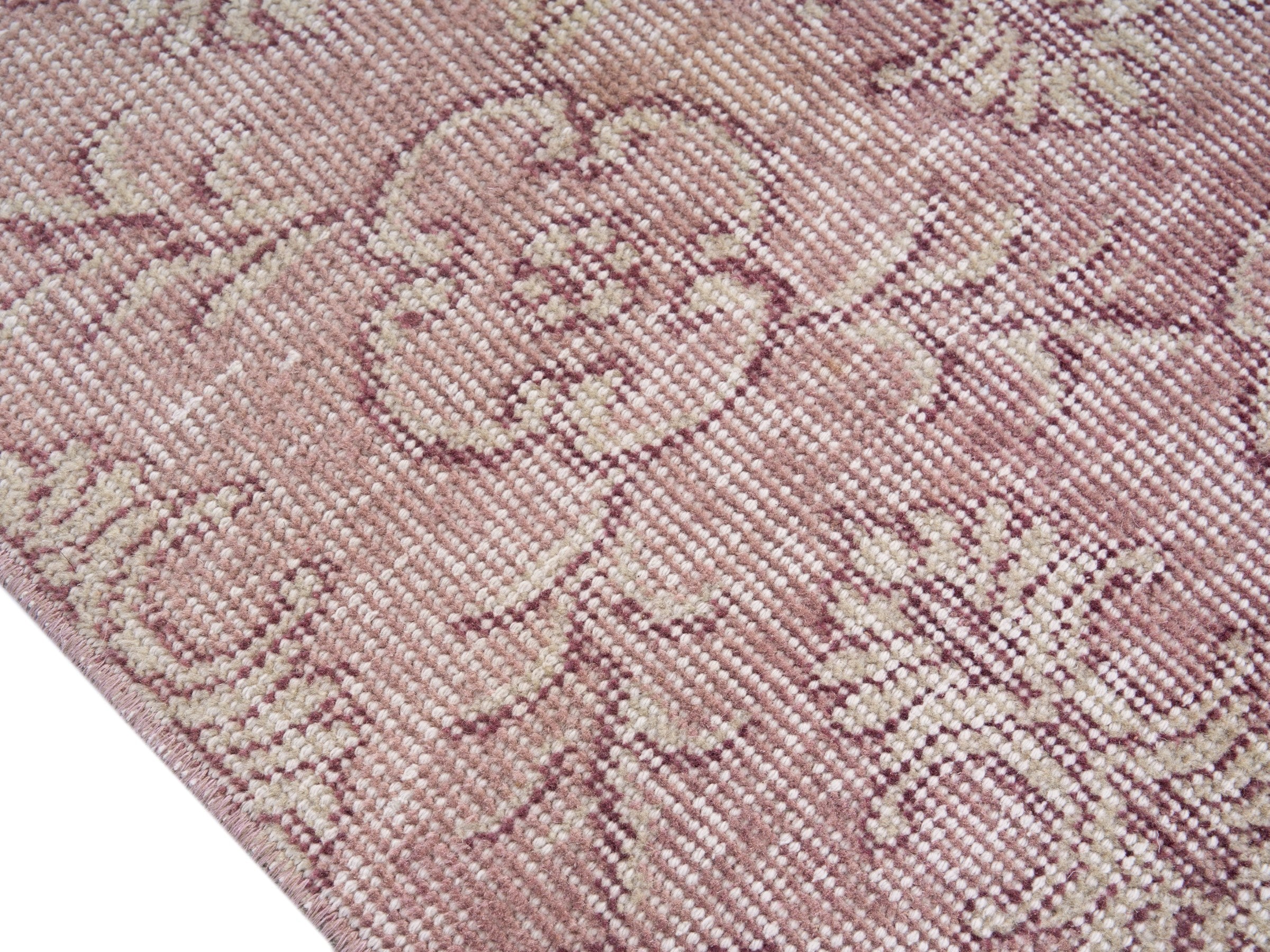 Turkish Isparta area rug in muted pink and dusty rose, view 6 of 10