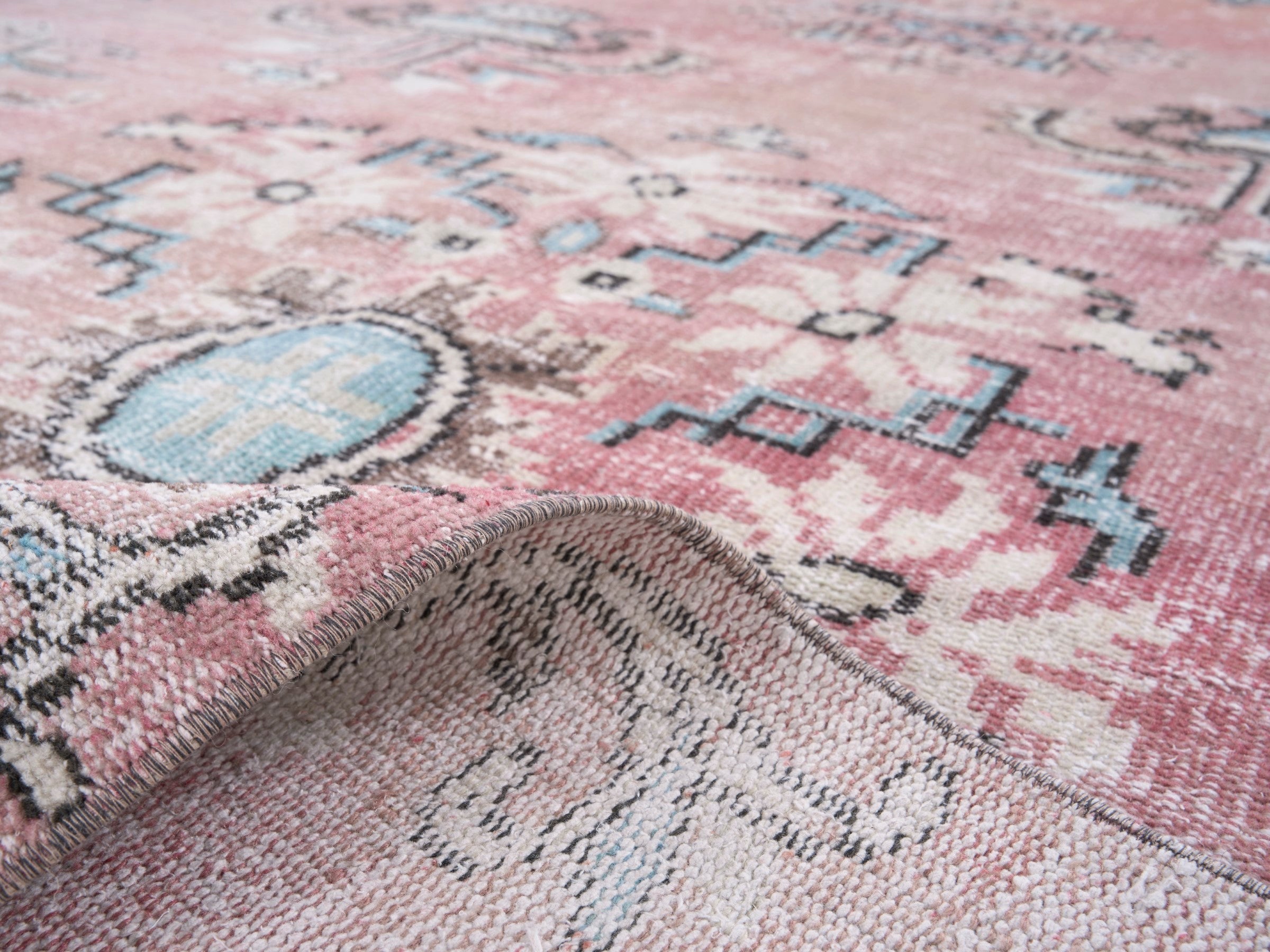 Turkish Manisa area rug in dusty rose and muted pink, view 9 of 10