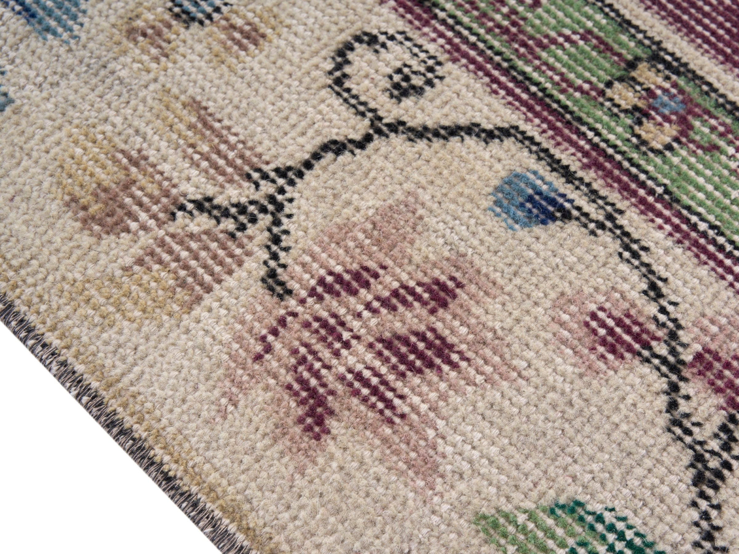 Turkish Isparta area rug in faded red and cream, view 6 of 10