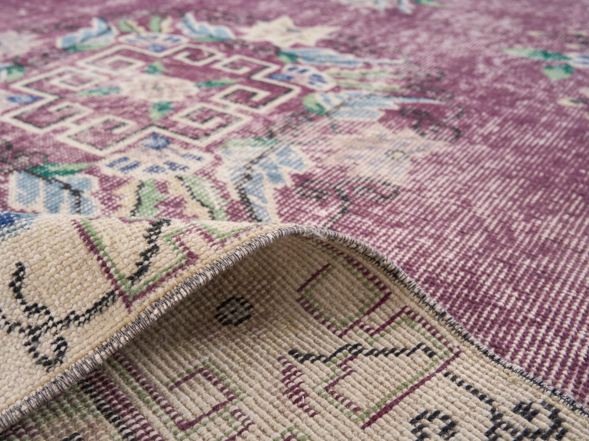Turkish Isparta area rug in faded red and cream, view 9 of 10