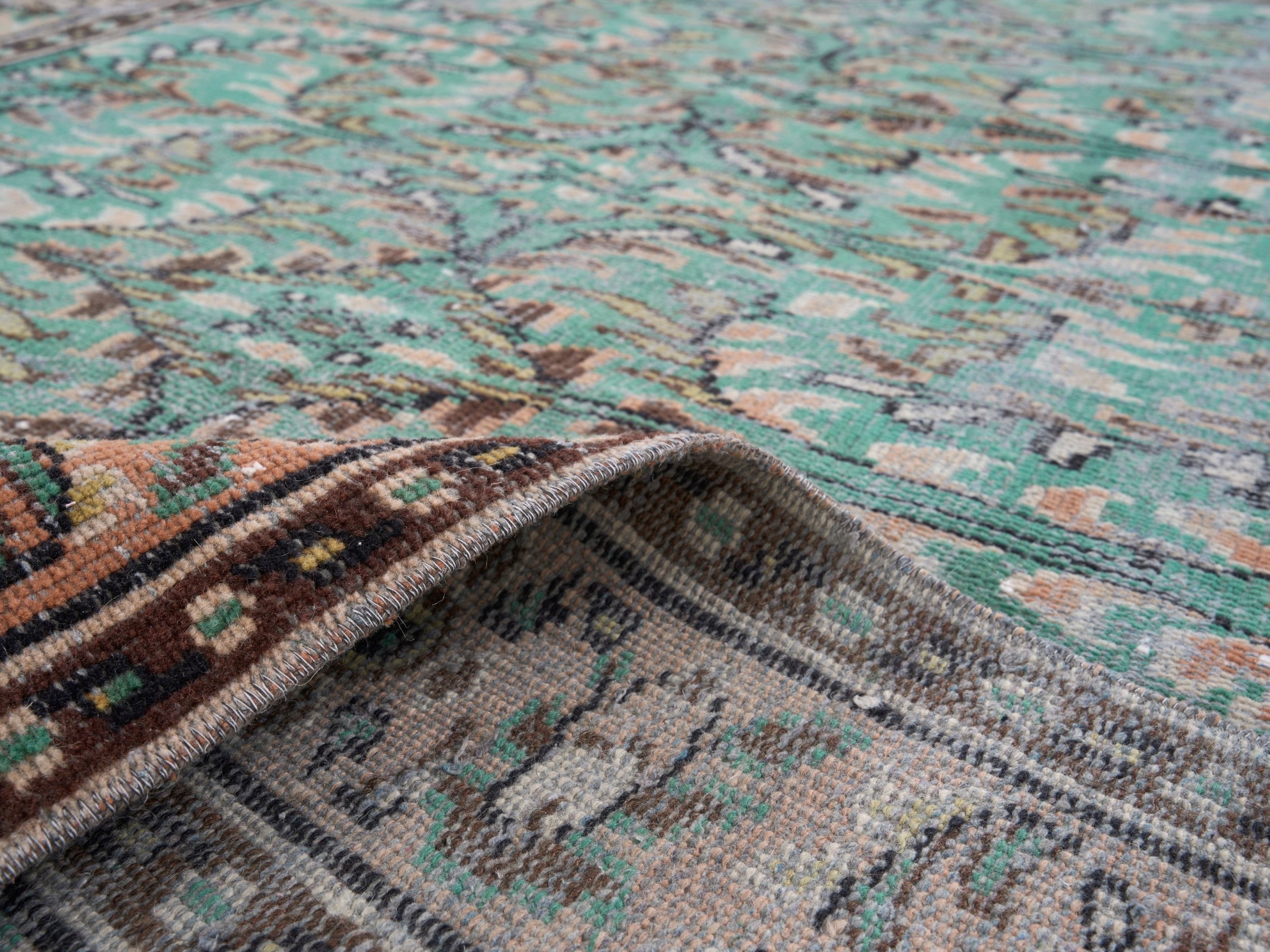 Turkish Manisa area rug in celadon and muted pink, view 9 of 10
