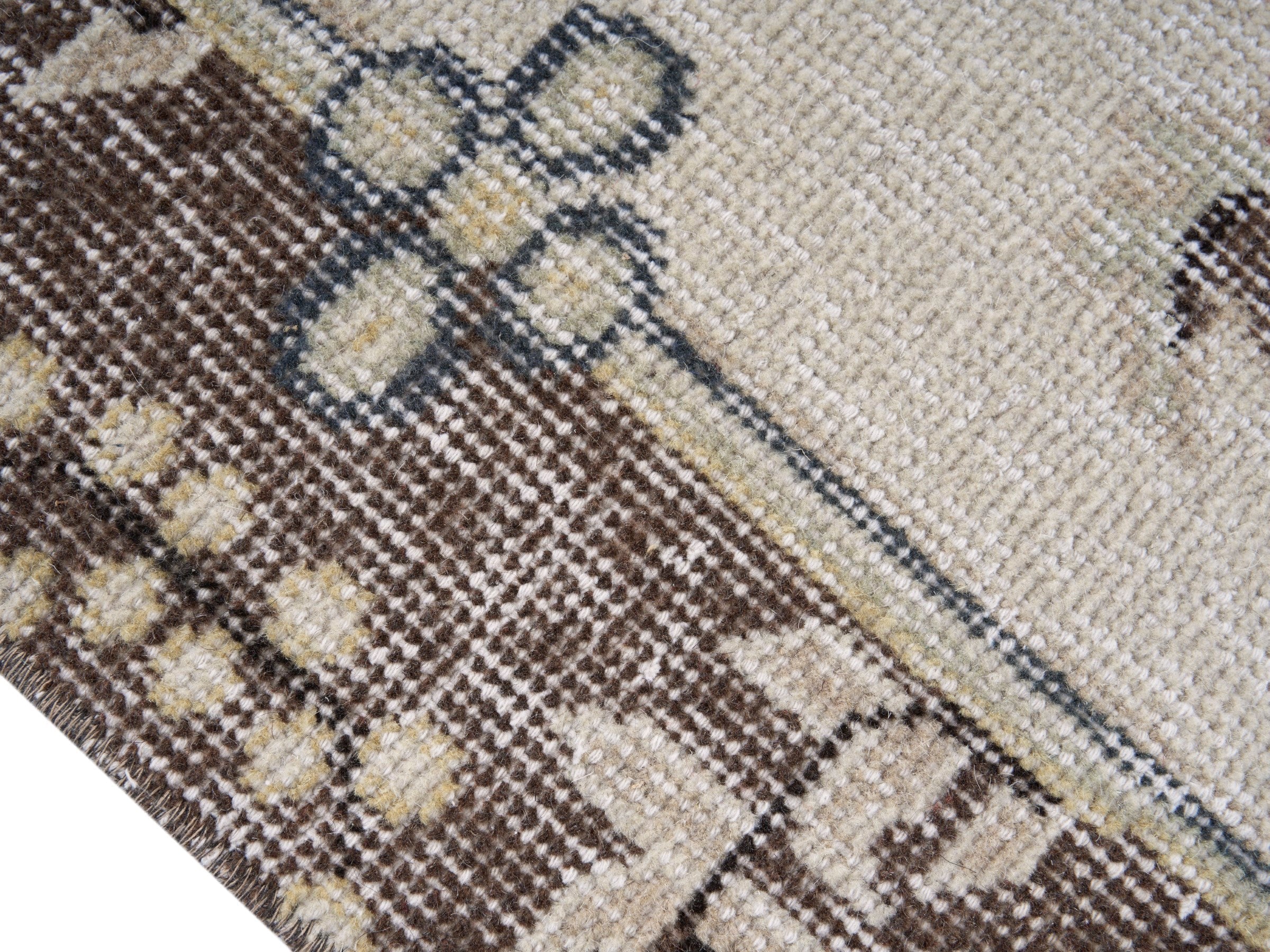 Turkish Isparta area rug in dusty rose and cream, view 6 of 10