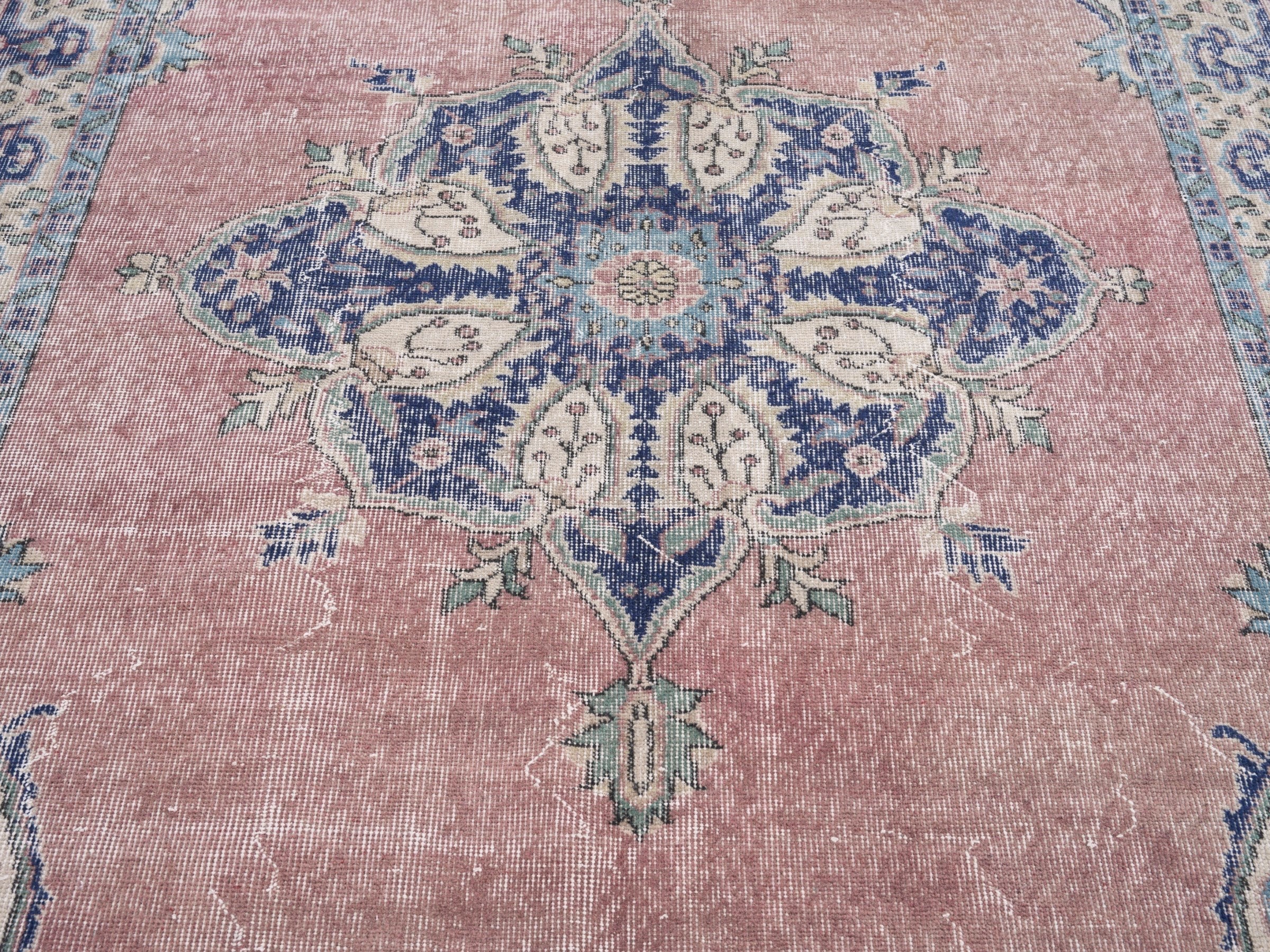 Turkish Isparta area rug in dusty rose and navy, view 4 of 10