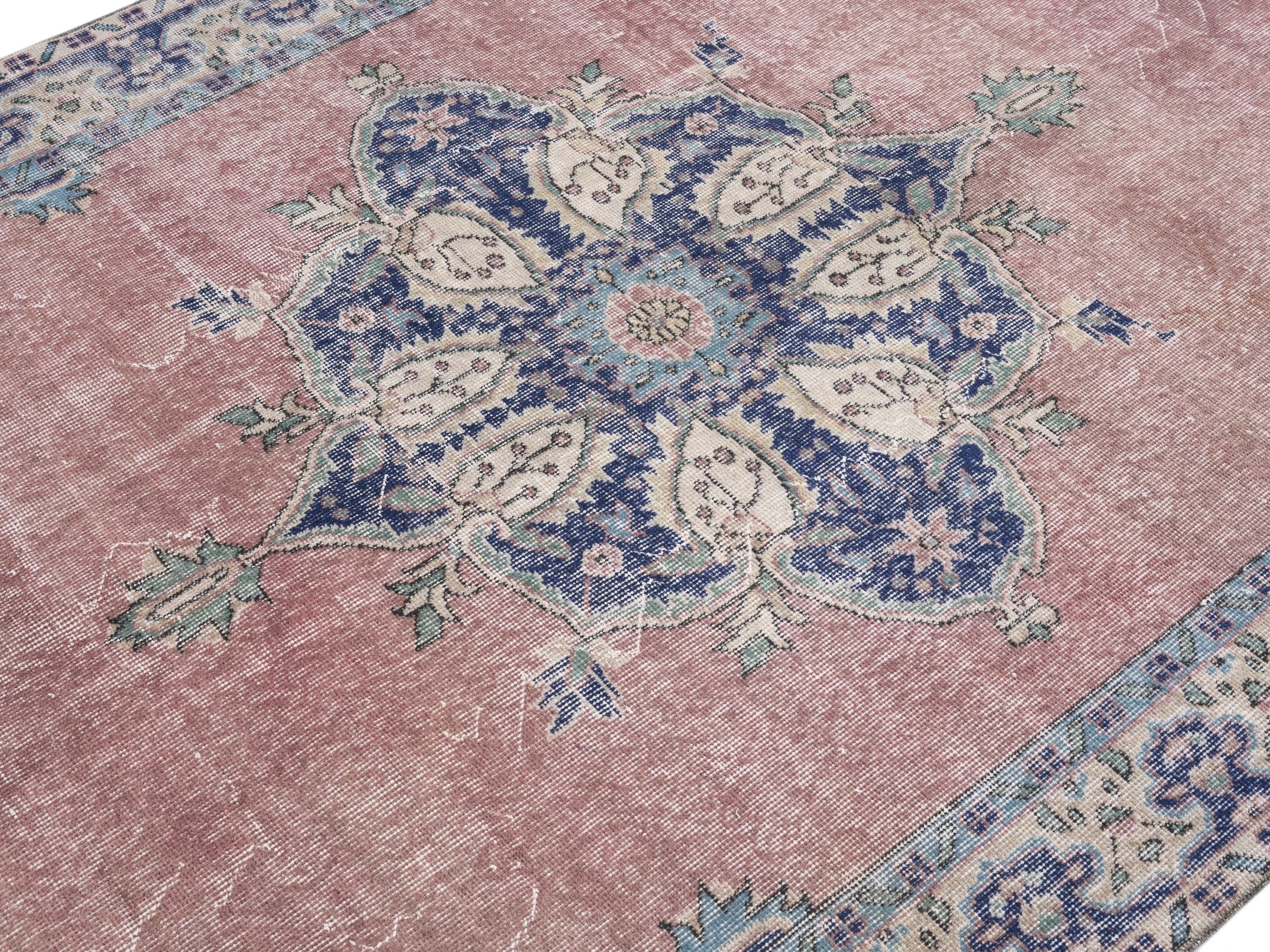 Turkish Isparta area rug in dusty rose and navy, view 5 of 10