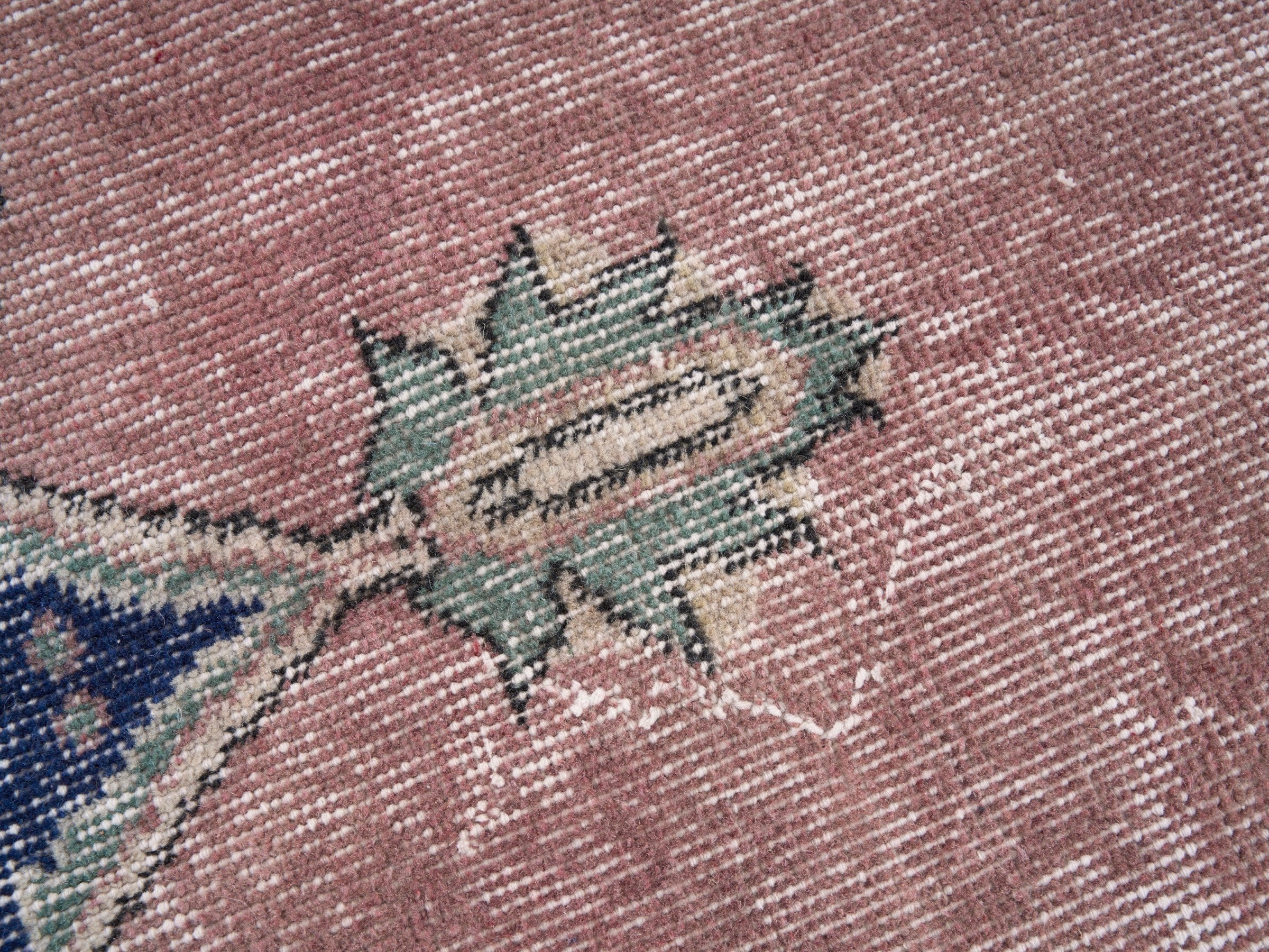Turkish Isparta area rug in dusty rose and navy, view 7 of 10