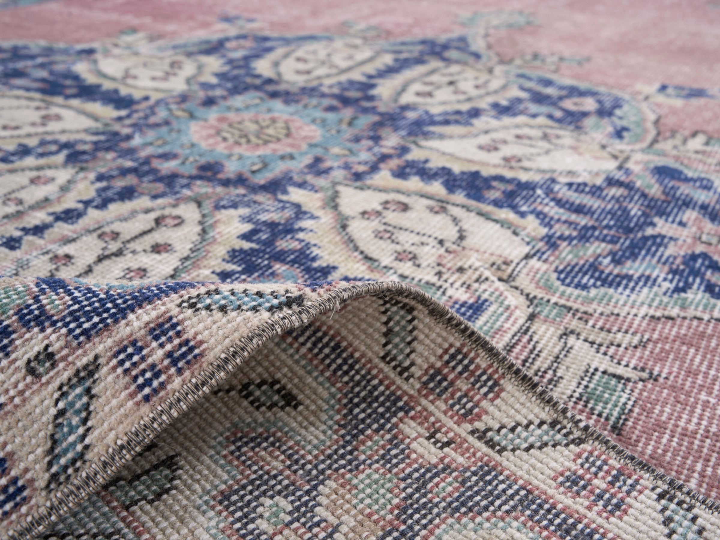Turkish Isparta area rug in dusty rose and navy, view 9 of 10
